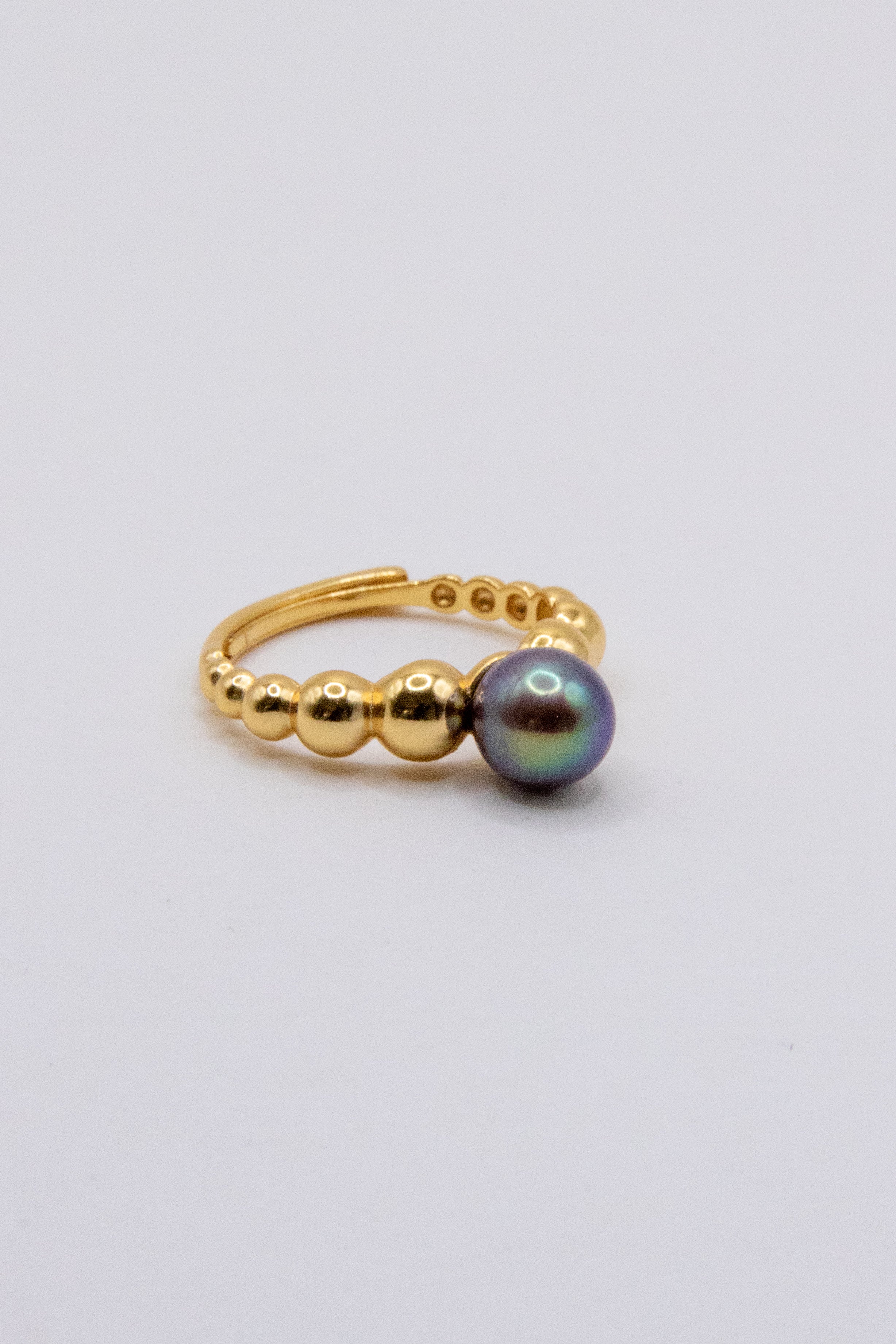 Natural dark blue/green toned freshwater seedless pearl ring