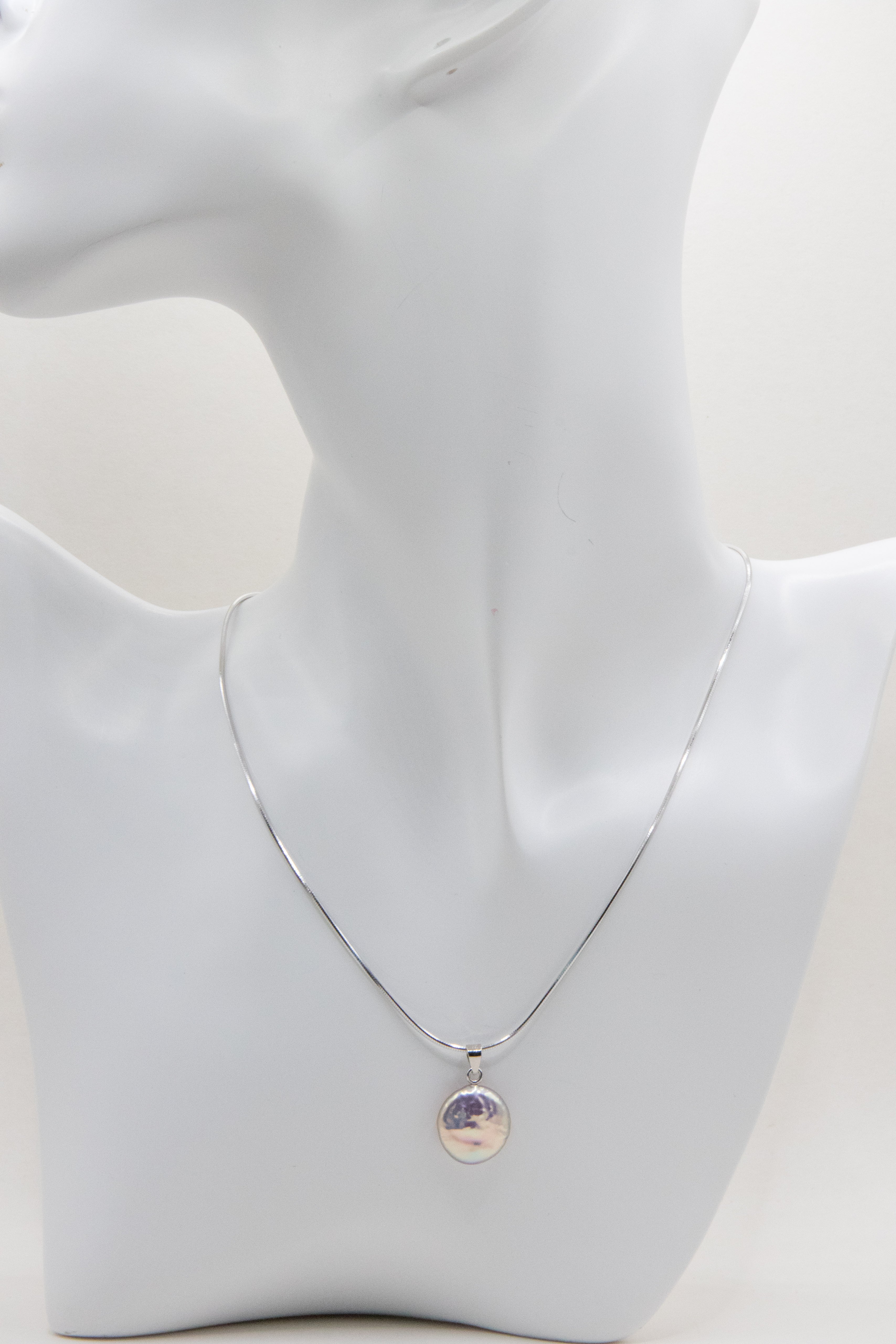 Shinier than silver- flawless freshwater button pearl necklace.