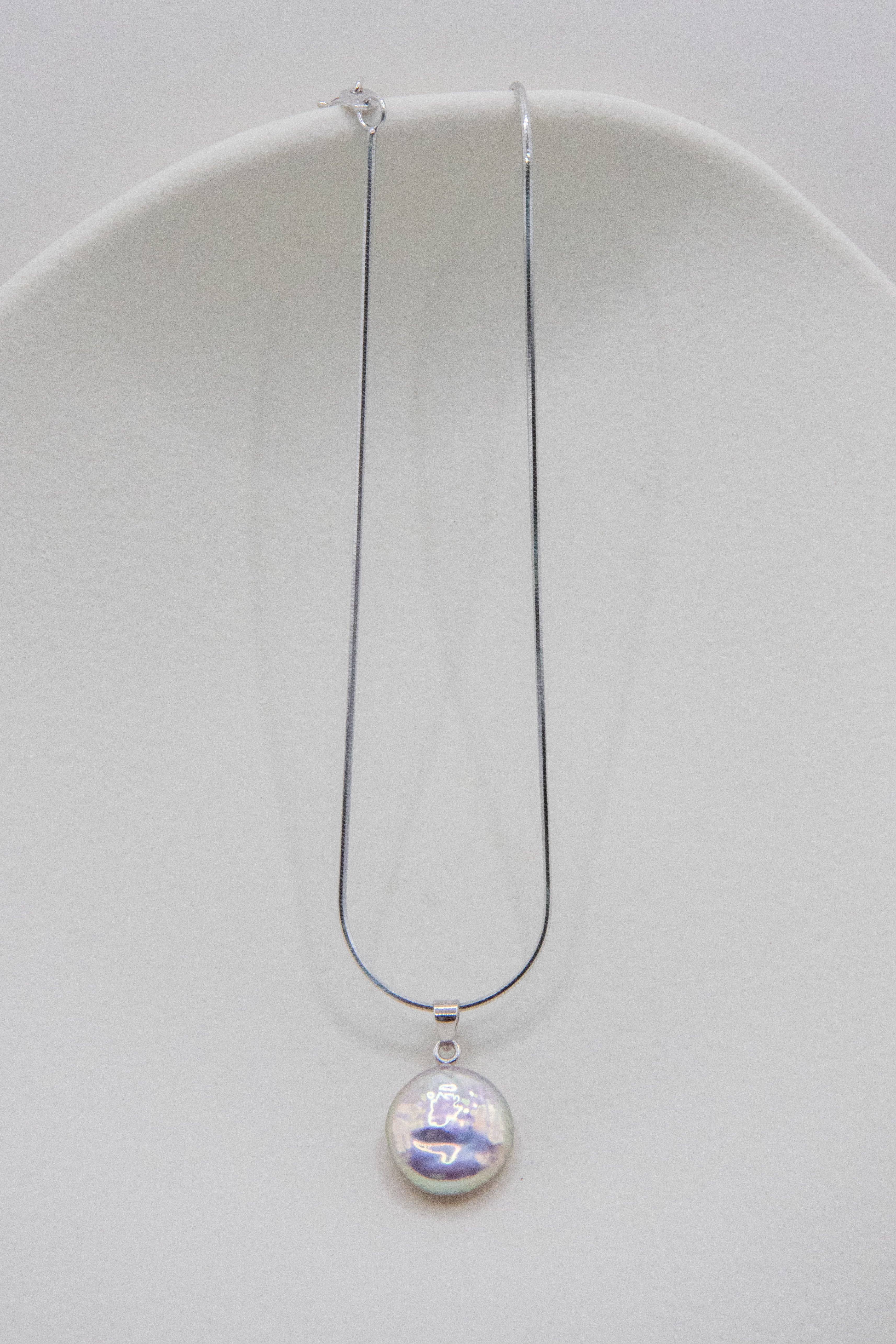 Shinier than silver- flawless freshwater button pearl necklace.
