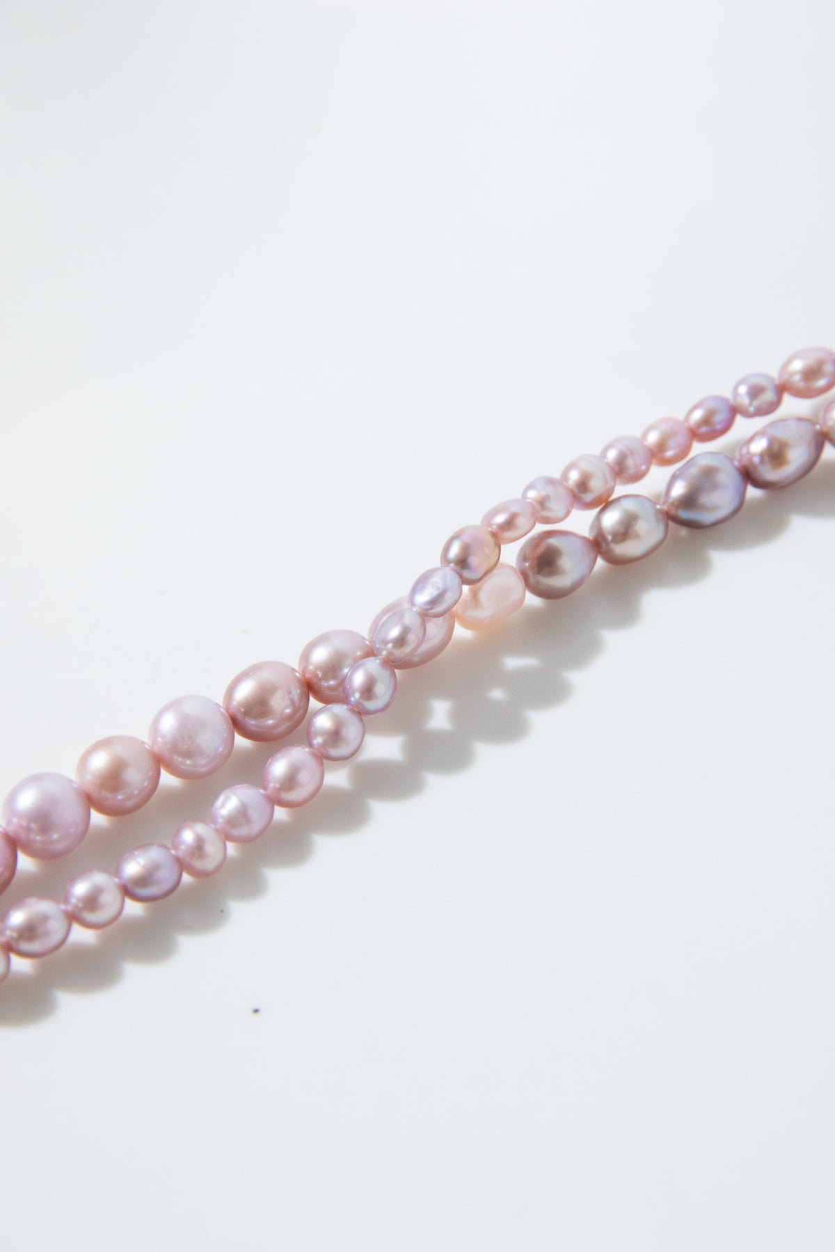 Natural lavender color freshwater pearl gradient sized necklace - 100cm long