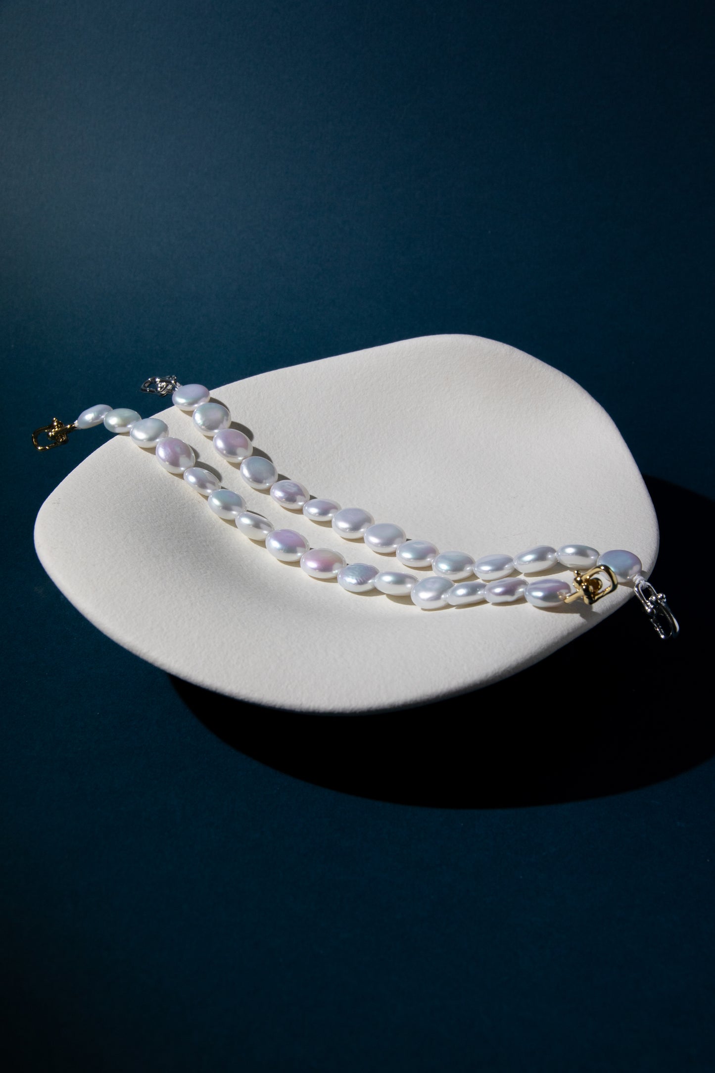 Top excellent level smooth flat button pearls in shiny standard white bracelets.