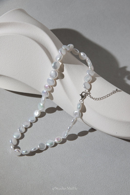 Button pearl necklace
