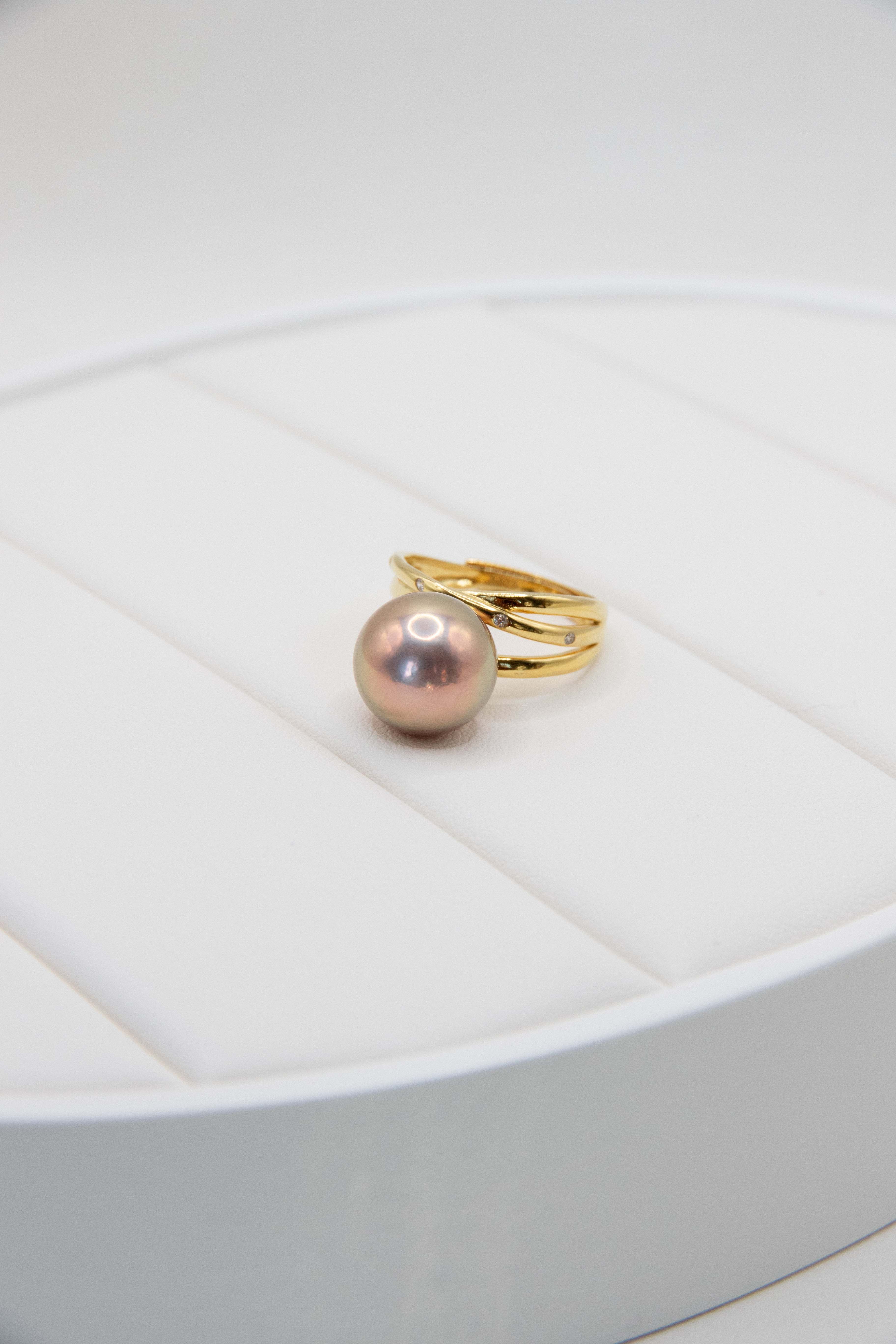 Excellent golden green big pearl