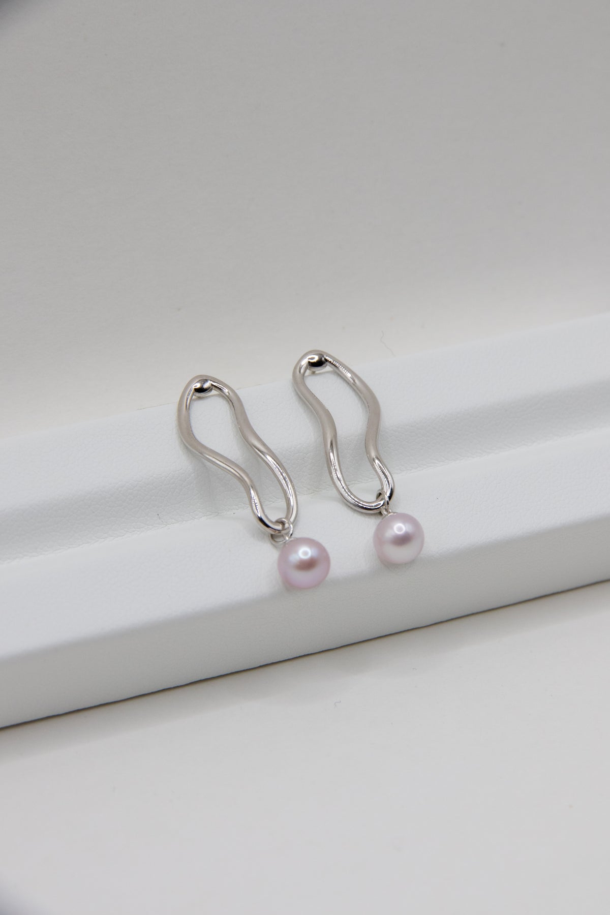 Delicate small White pink Pearl Curve Earrings