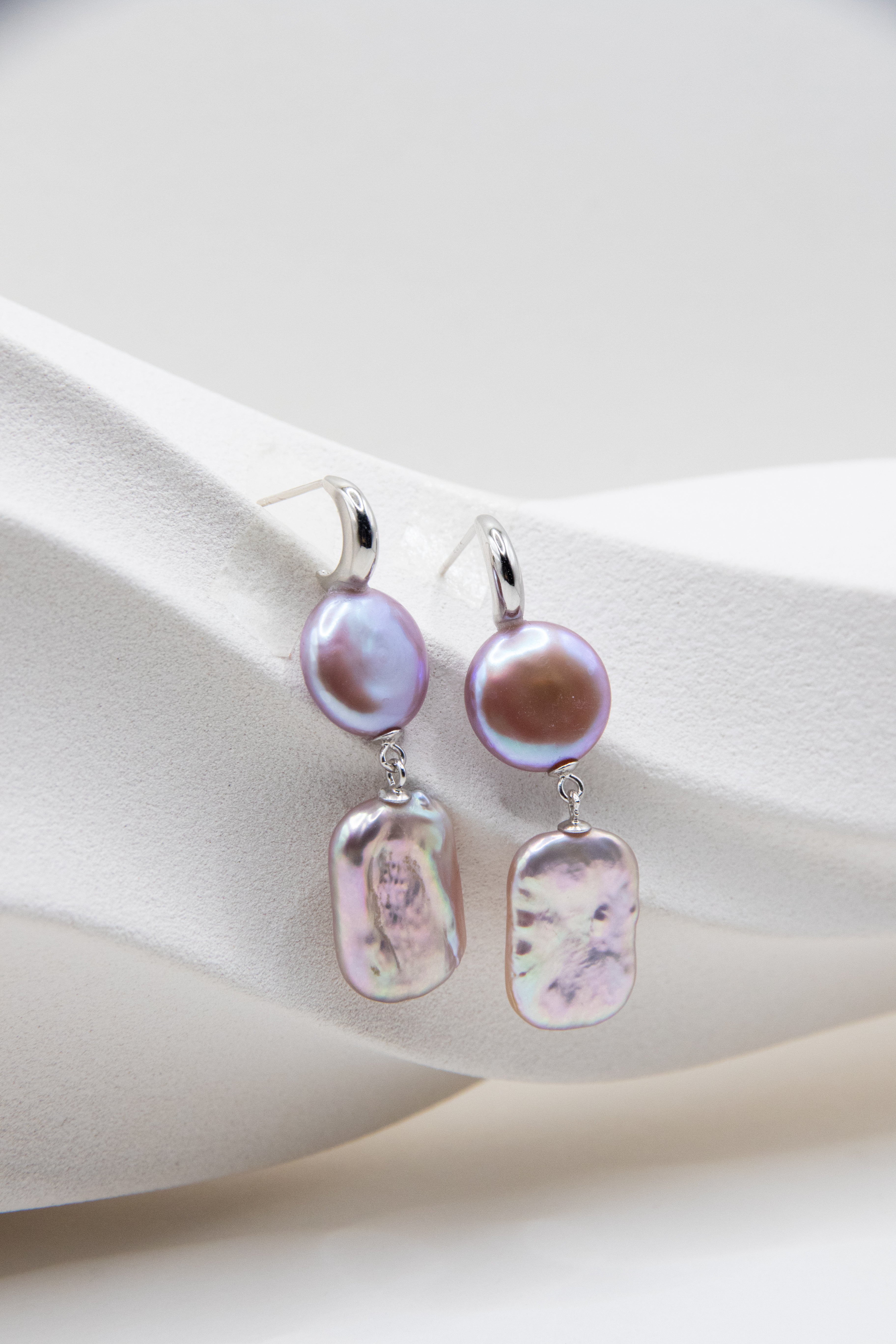 Round or Square? Still or Dangling?