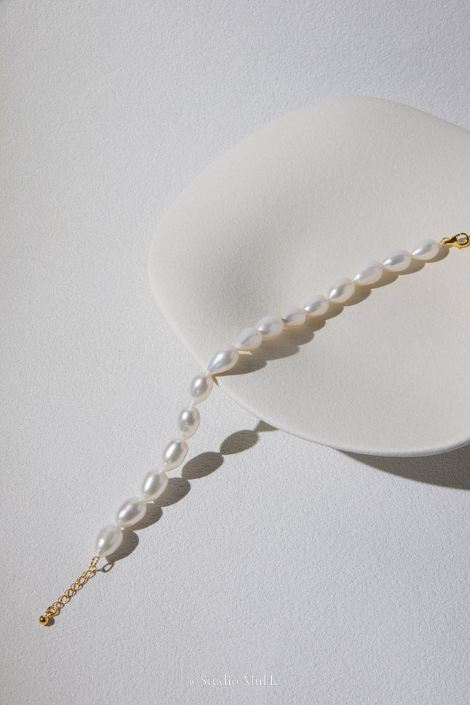 Natural Elegance — White Seedless Freshwater Pearl Drop Bracelet