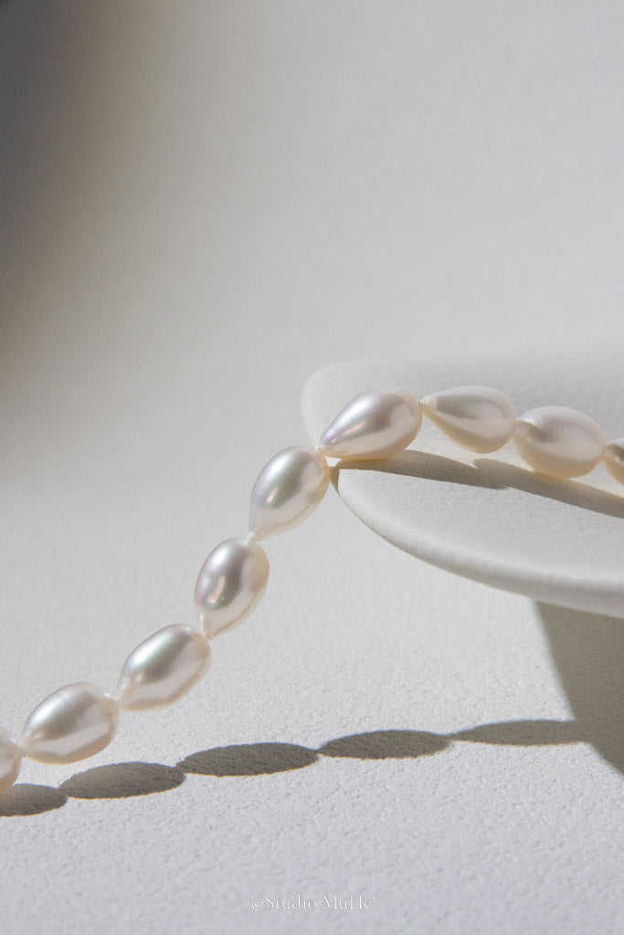 Natural Elegance — White Seedless Freshwater Pearl Drop Bracelet