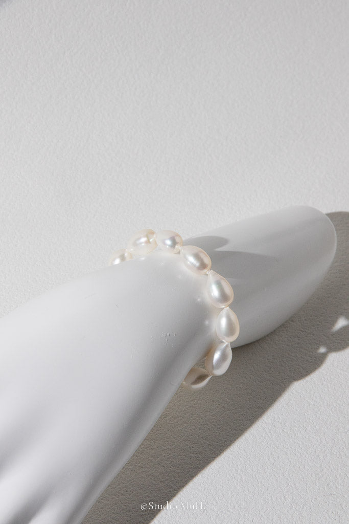 Natural Elegance — White Seedless Freshwater Pearl Drop Bracelet
