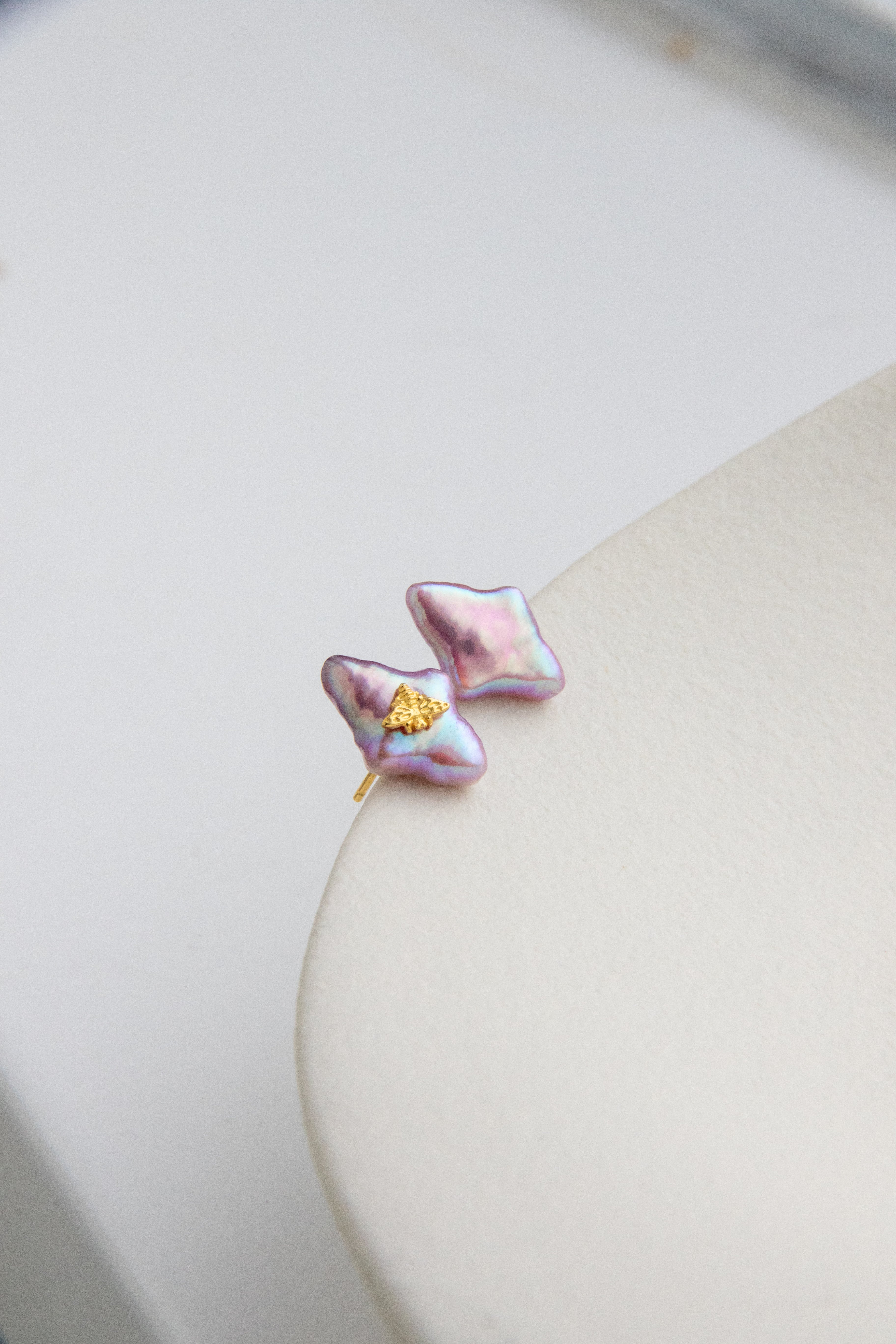 Cherry pink Polaris studs