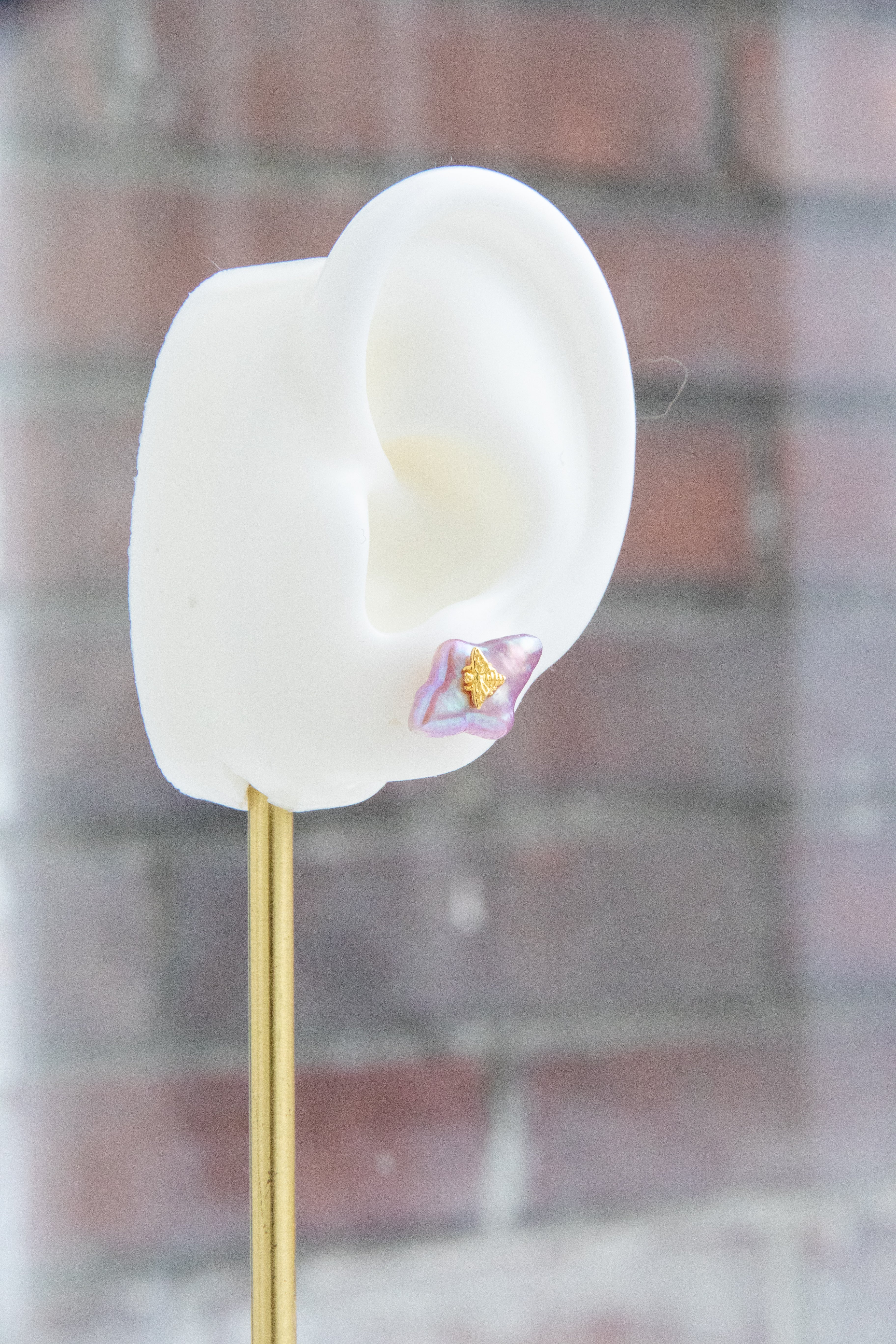 Cherry pink Polaris studs