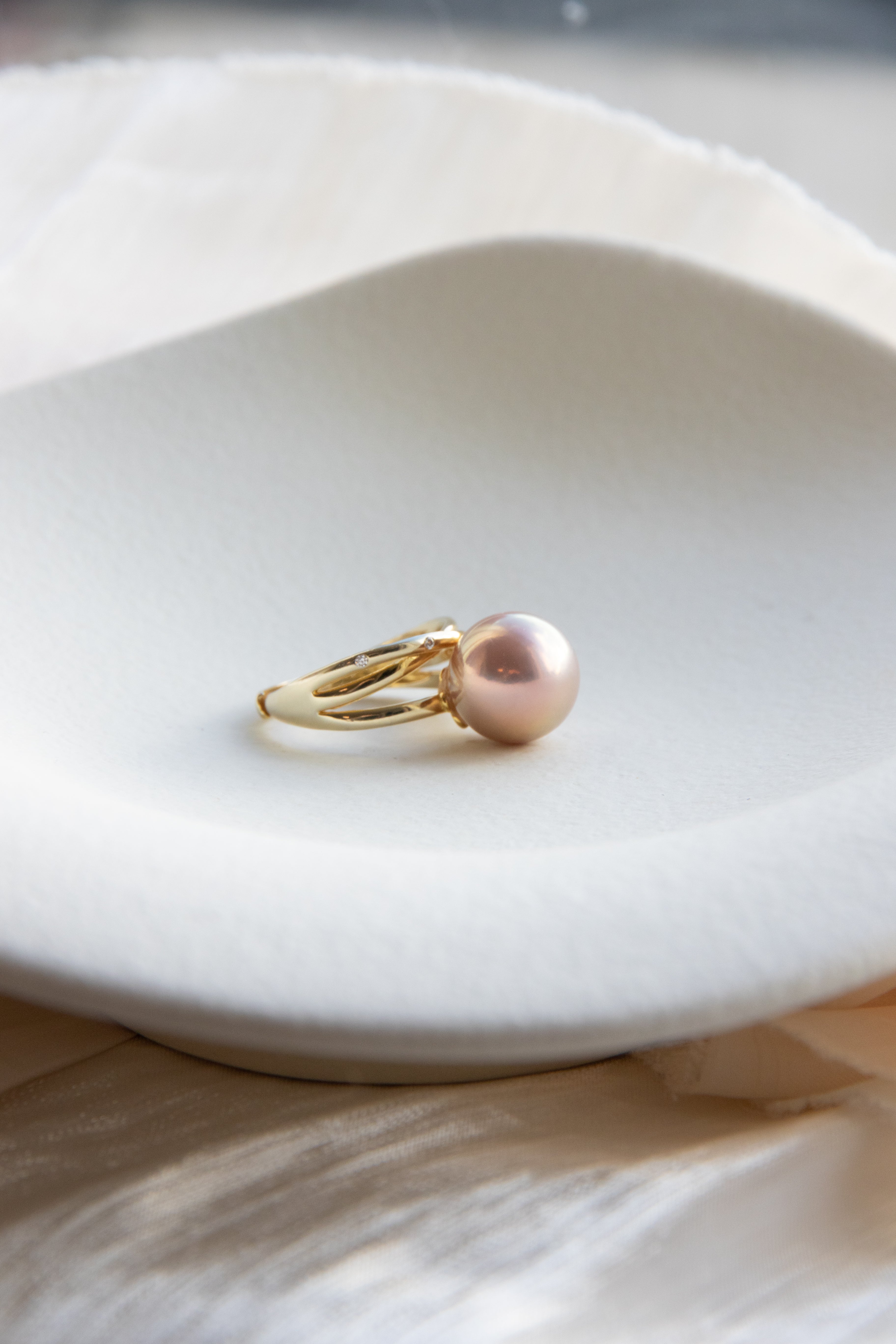 Excellent golden green big pearl