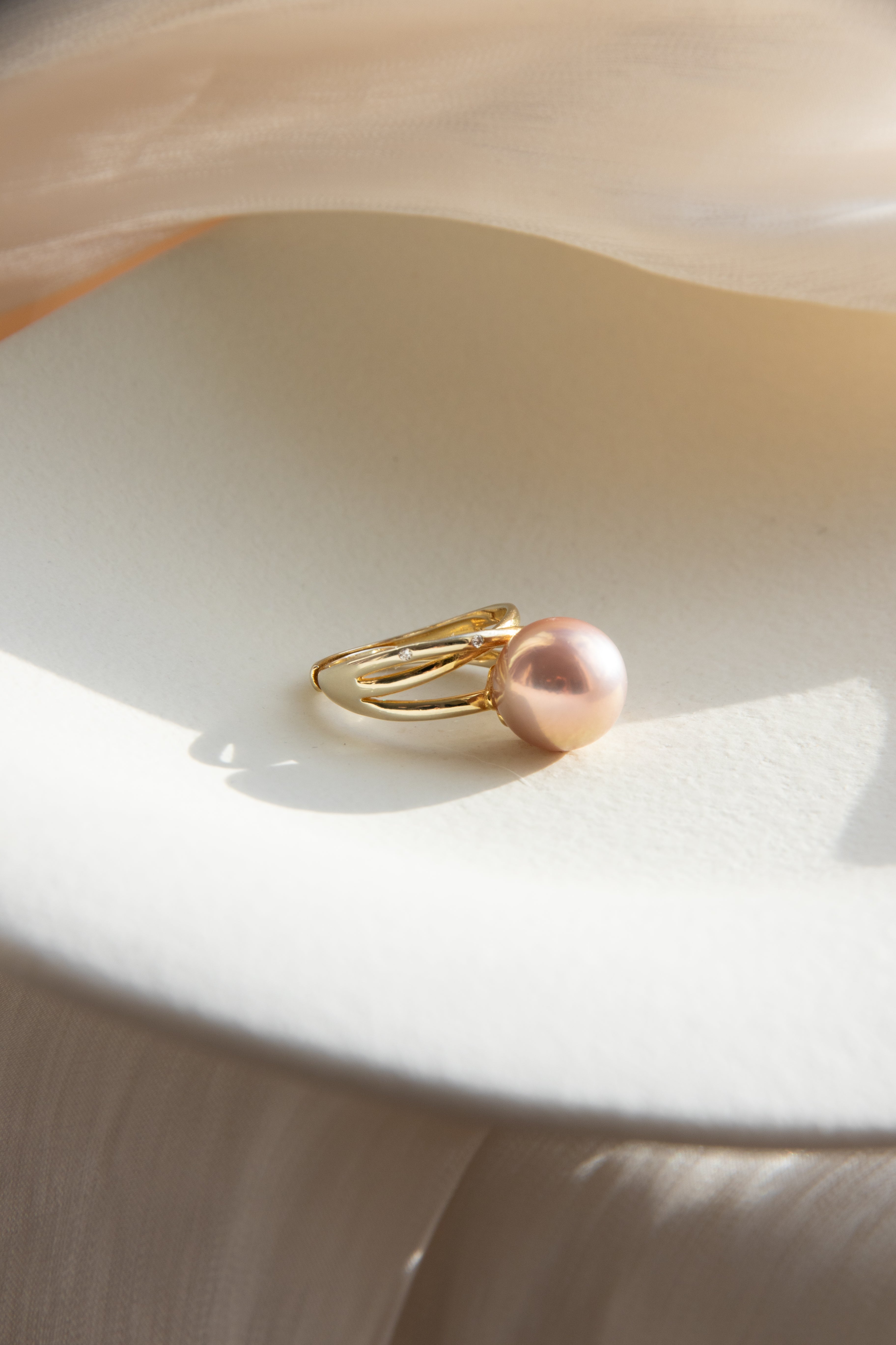 Excellent golden green big pearl