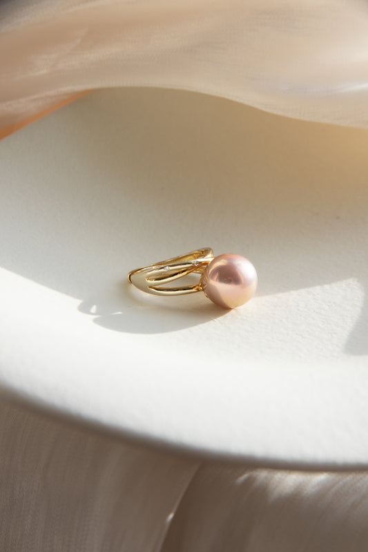 Excellent golden green big pearl