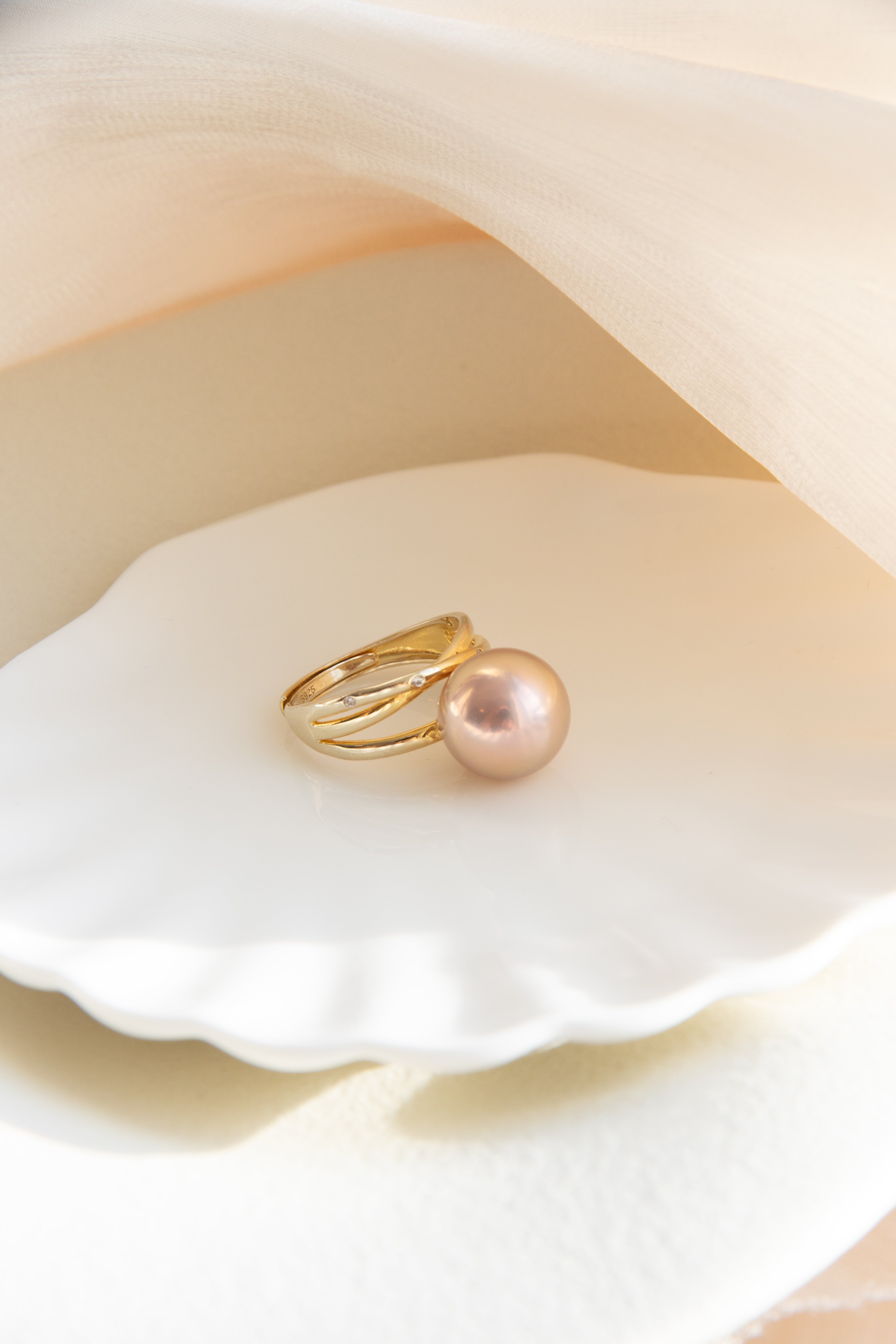 Excellent golden green big pearl