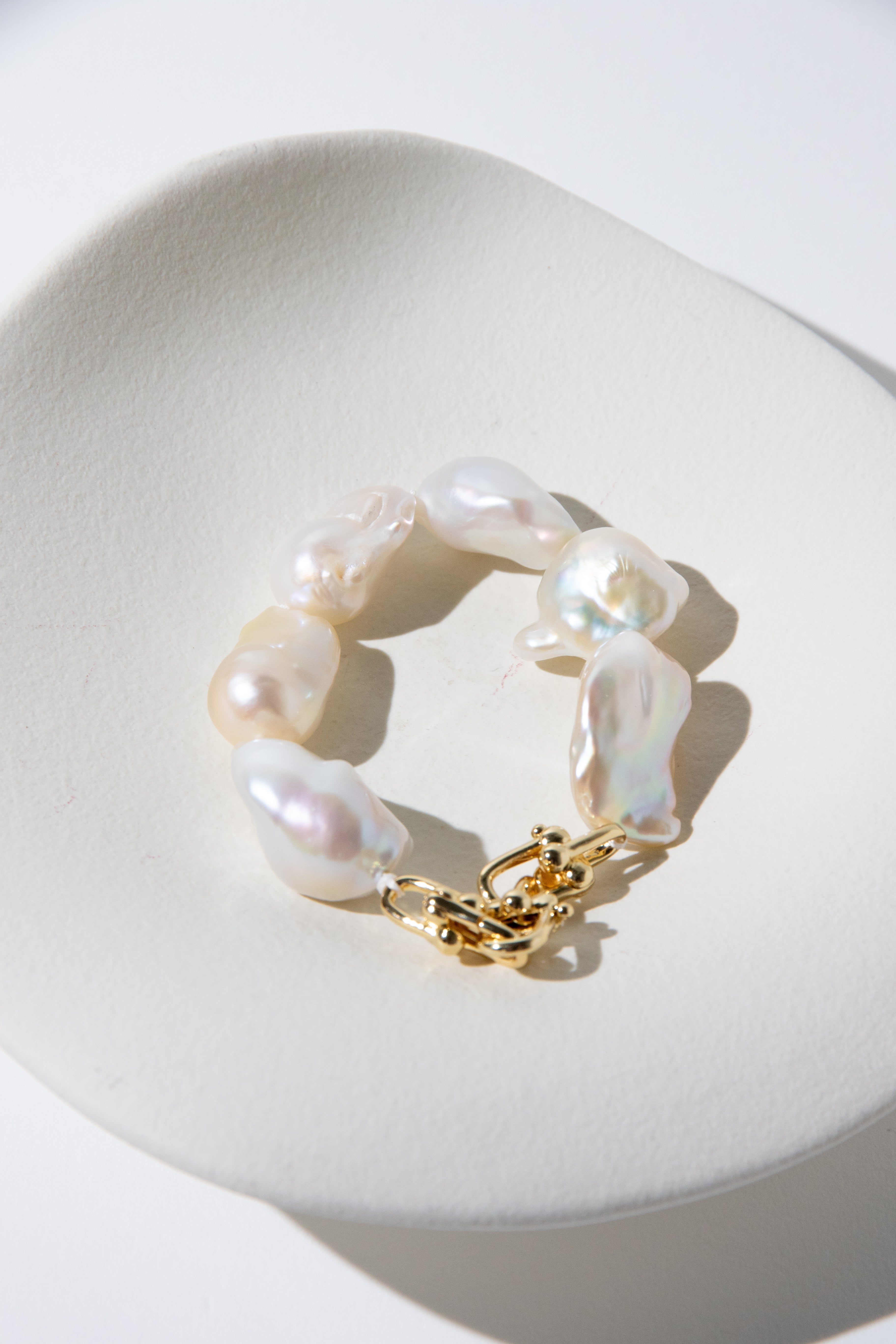 Entry level big natural white baroque pearl bracelet