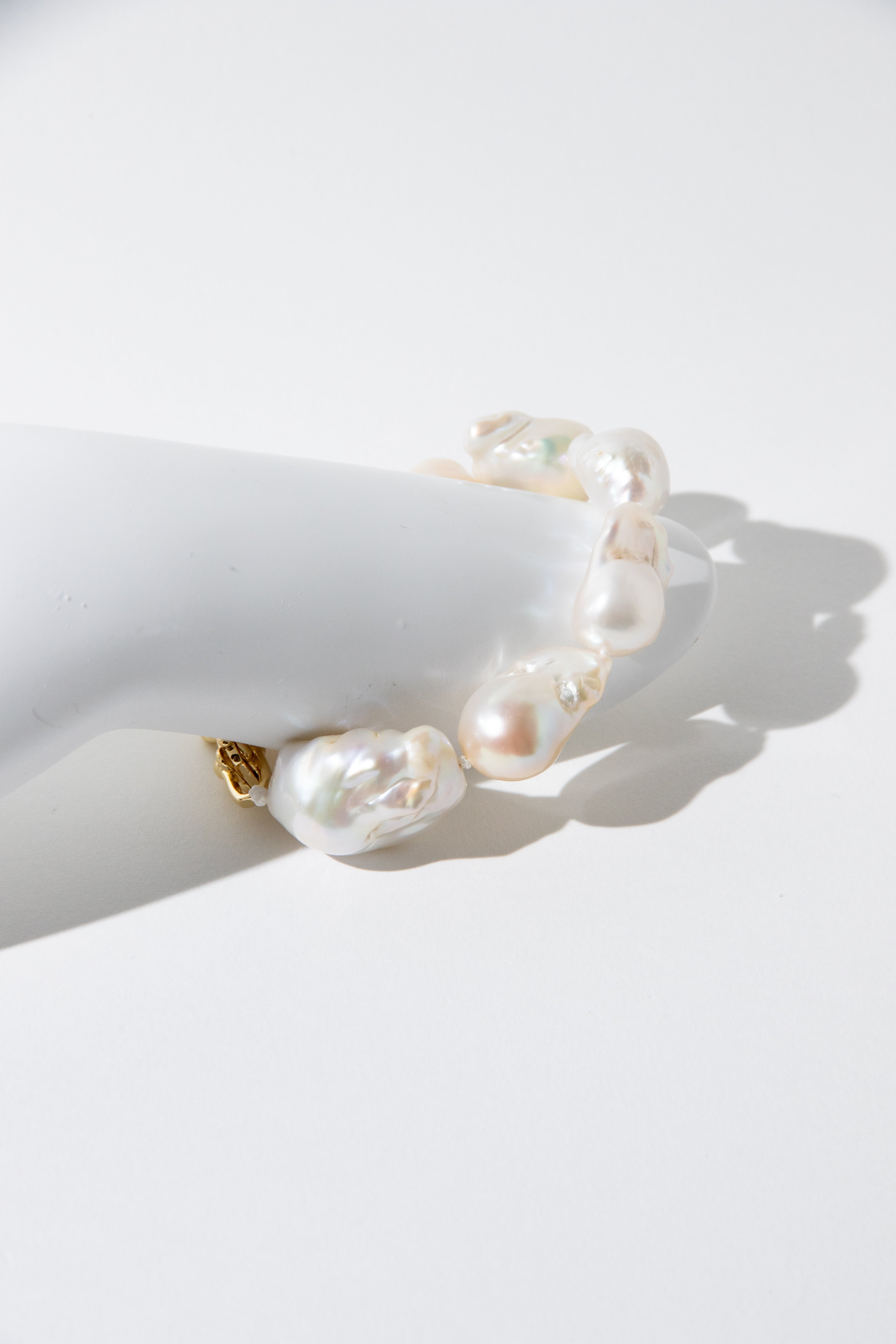 Entry level big natural white baroque pearl bracelet