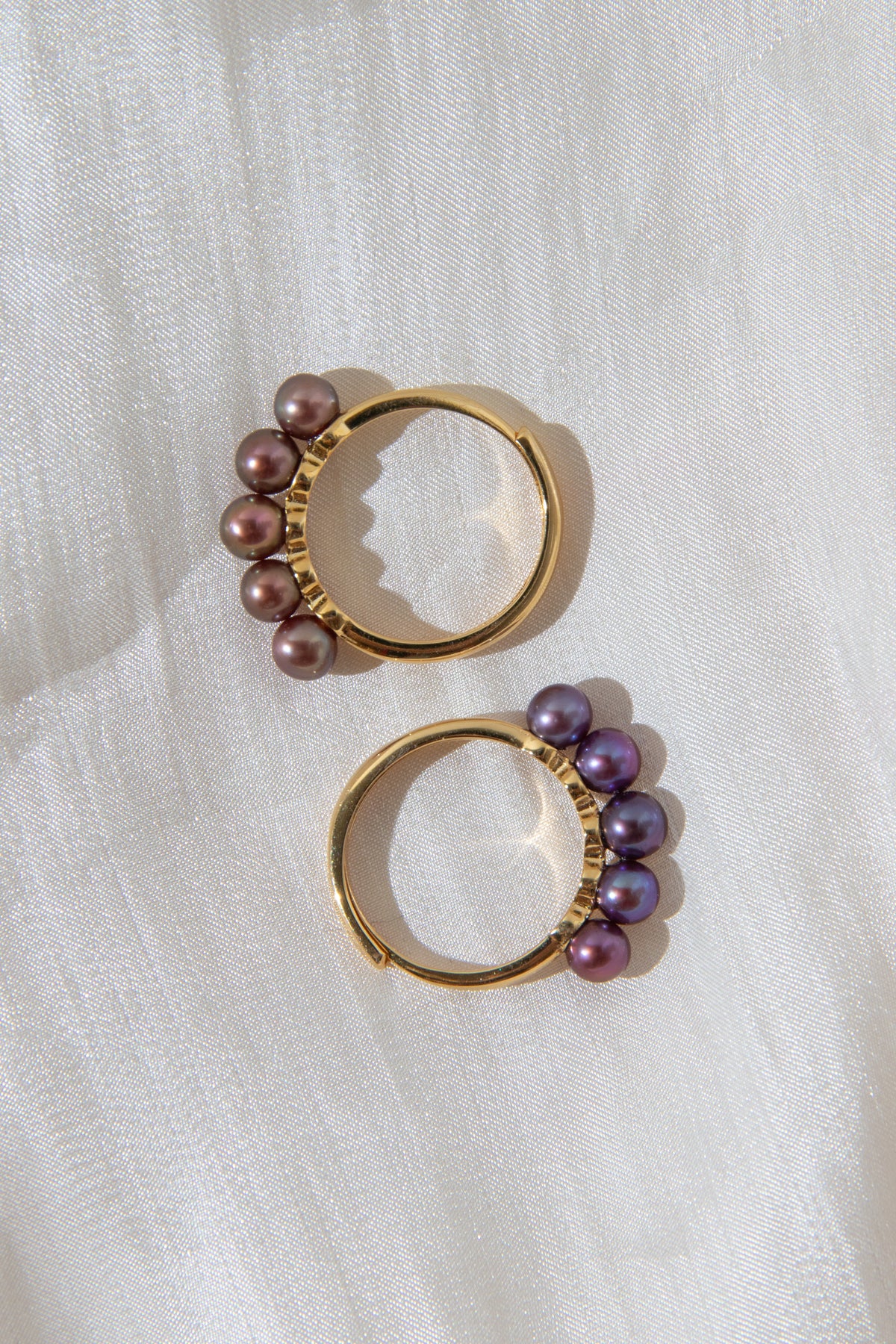 Perfect peak-mini freshwater pearl rings with excellent unique intense colors.