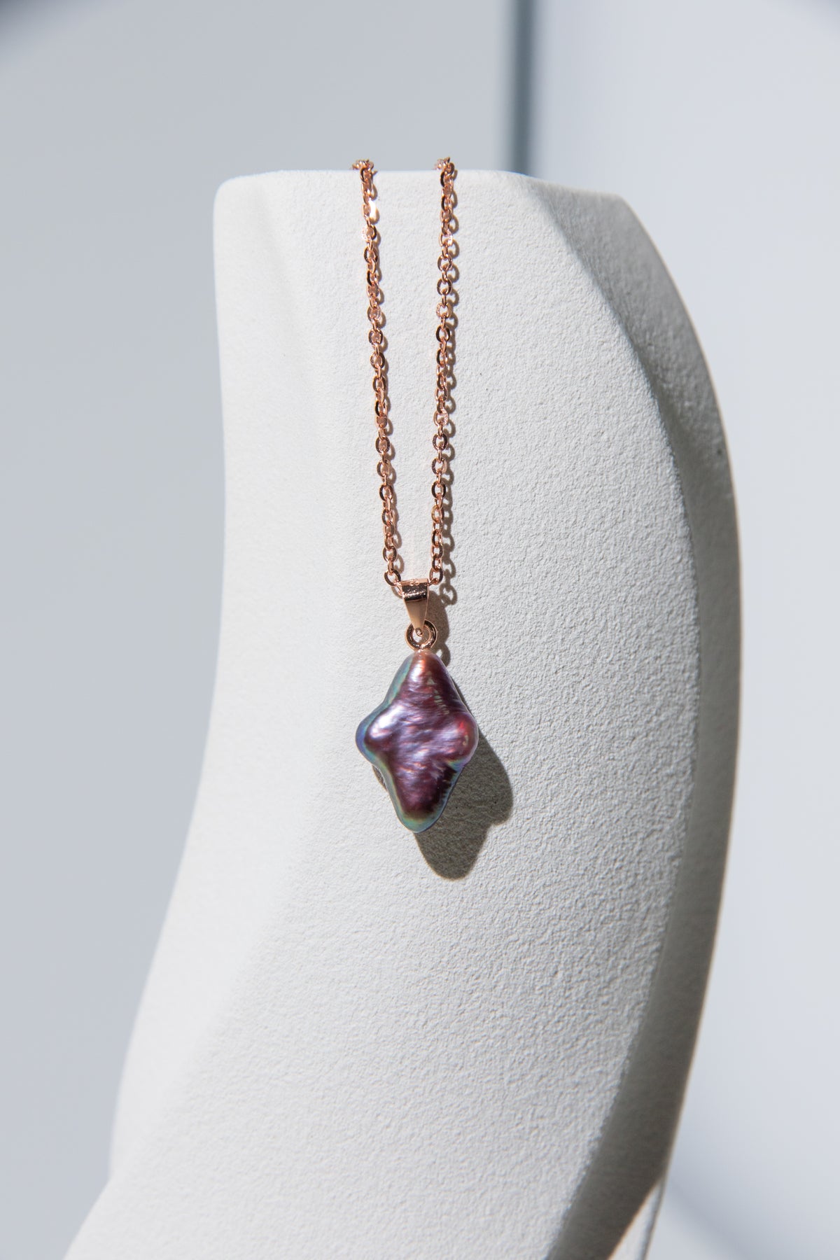 wine violet polar star necklace with rosegold plated silver chain.