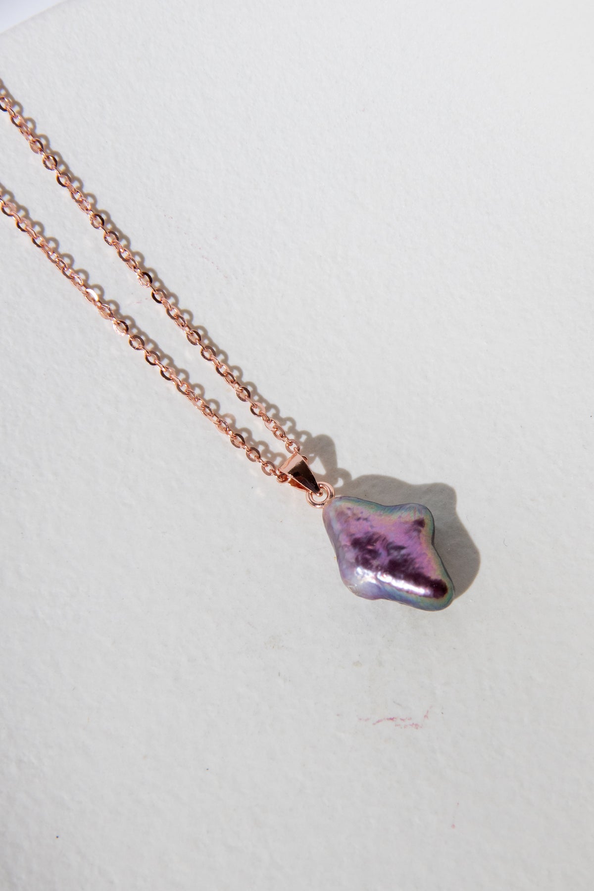 wine violet polar star necklace with rosegold plated silver chain.
