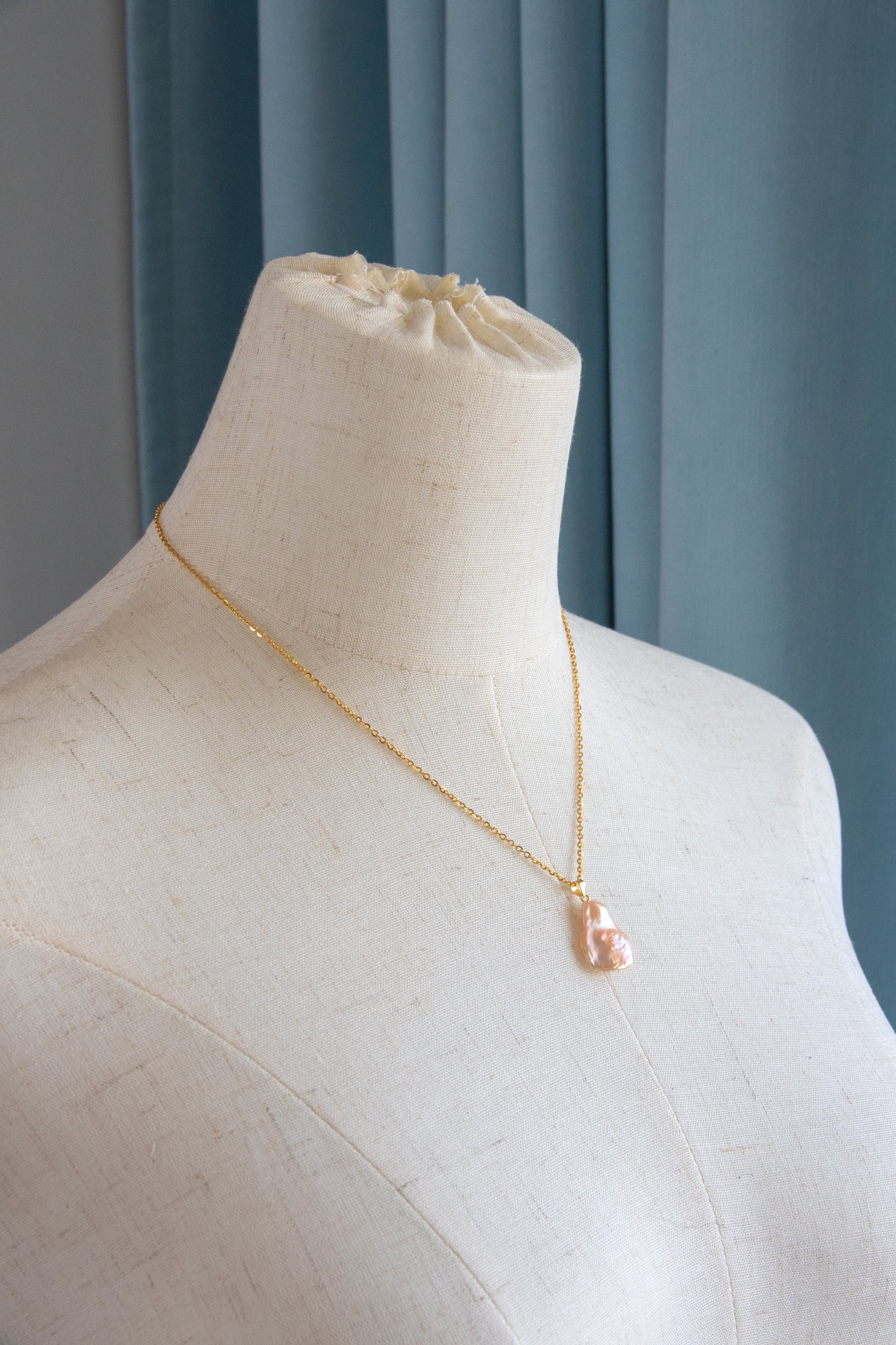 Shiny warm golden pink flower petal pearl necklace-gold plated silver chain.