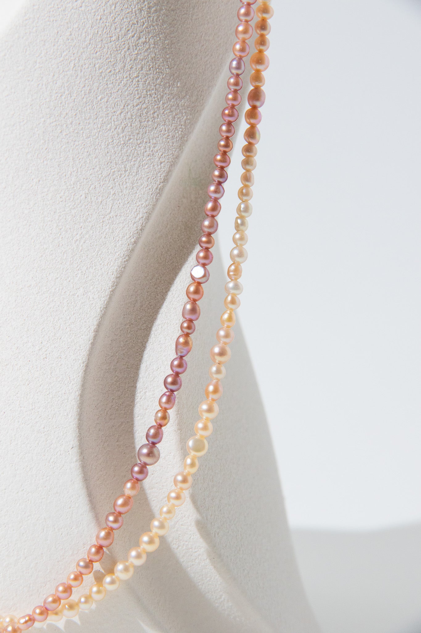 Long mini caviar sized rainbow pearl necklace