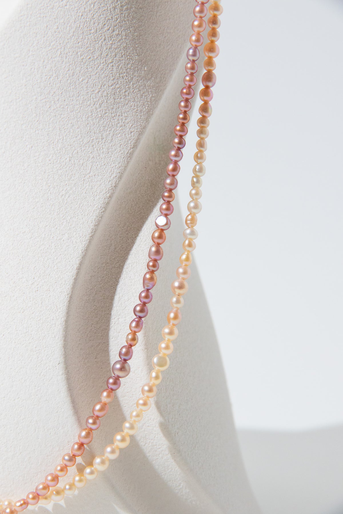 Long mini caviar sized rainbow pearl necklace