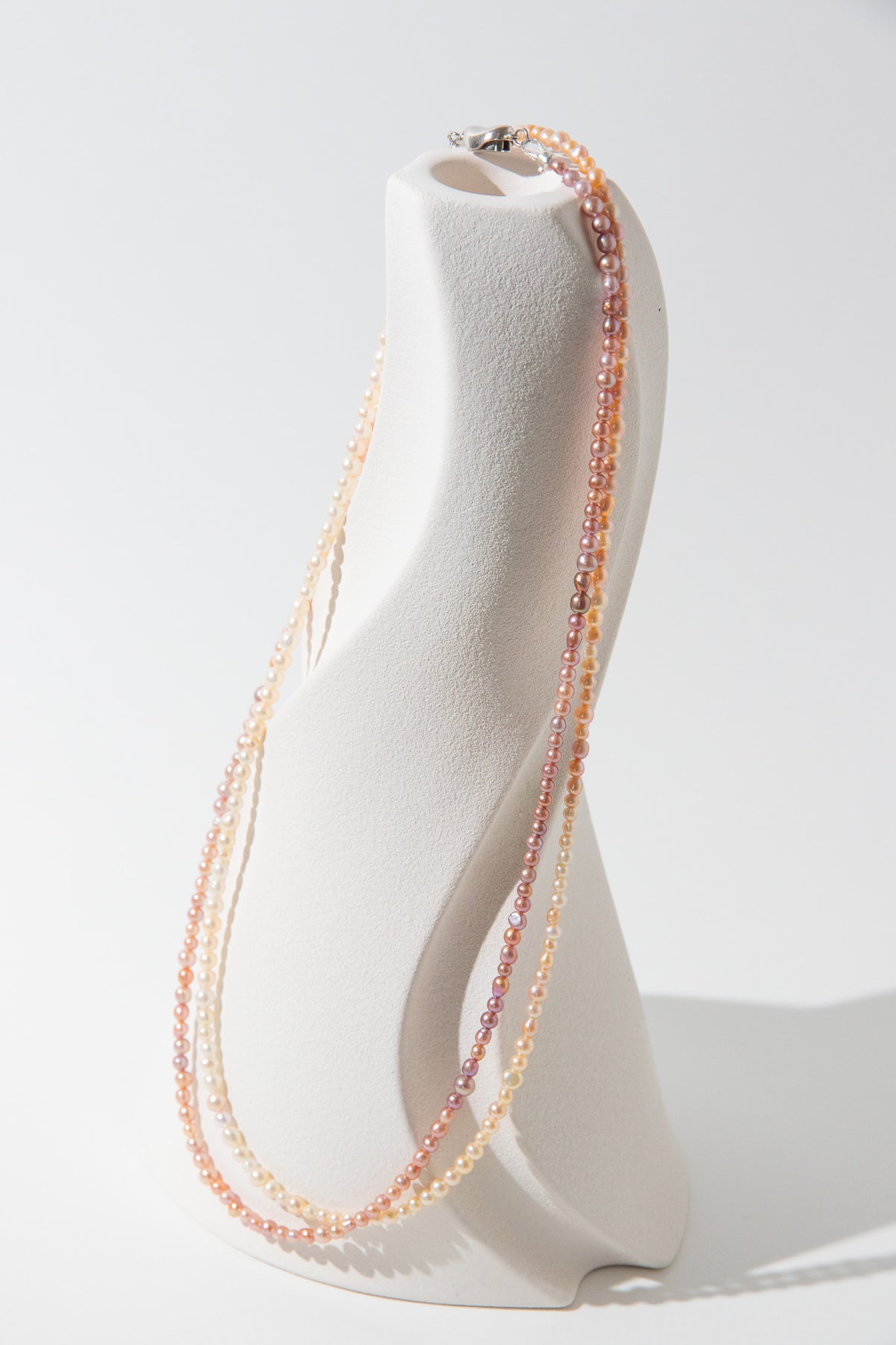 Long mini caviar sized rainbow pearl necklace