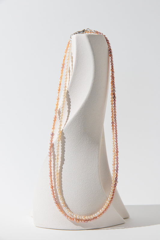 Long mini caviar sized rainbow pearl necklace