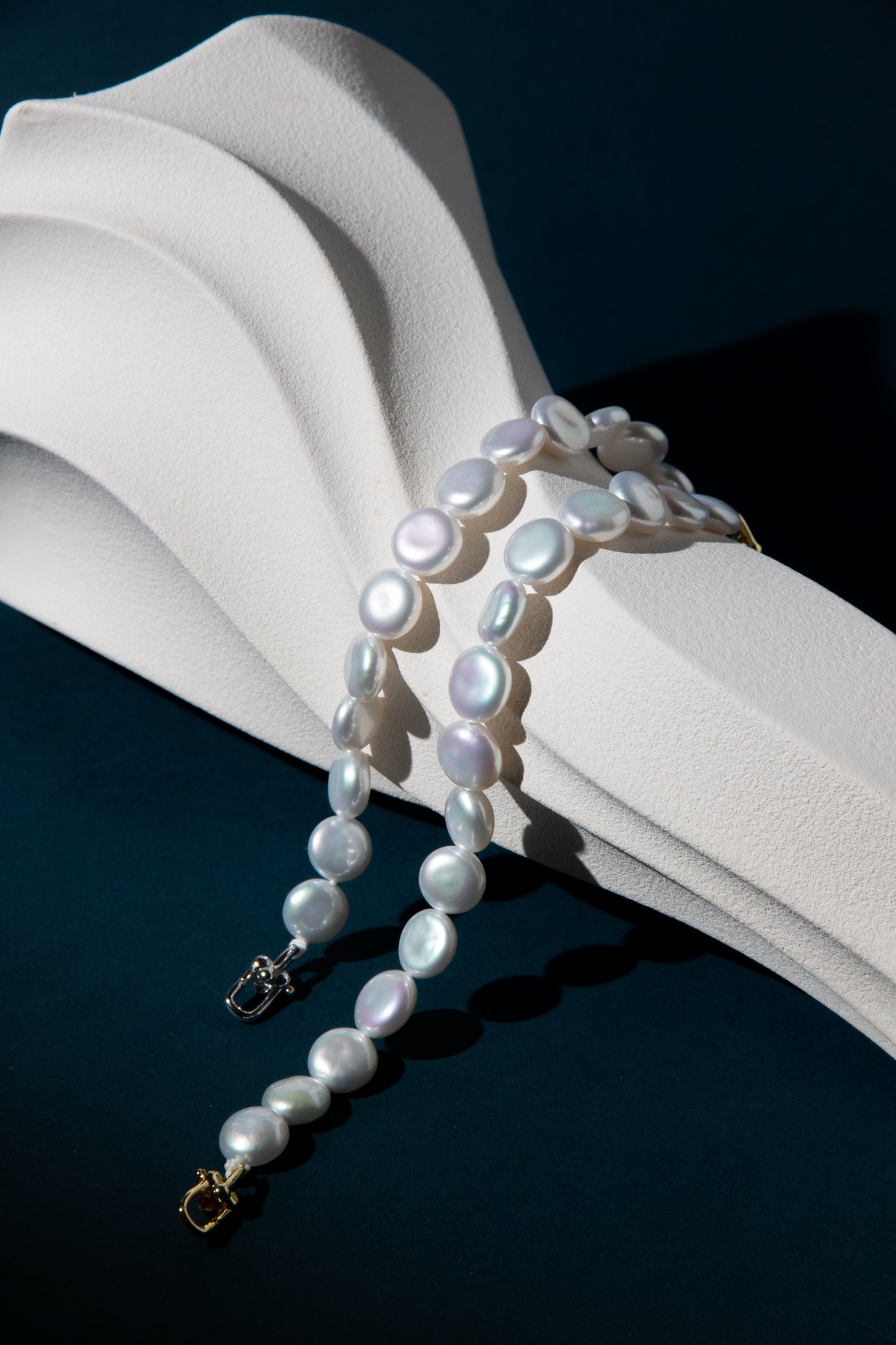 Top excellent level smooth flat button pearls in shiny standard white bracelets.