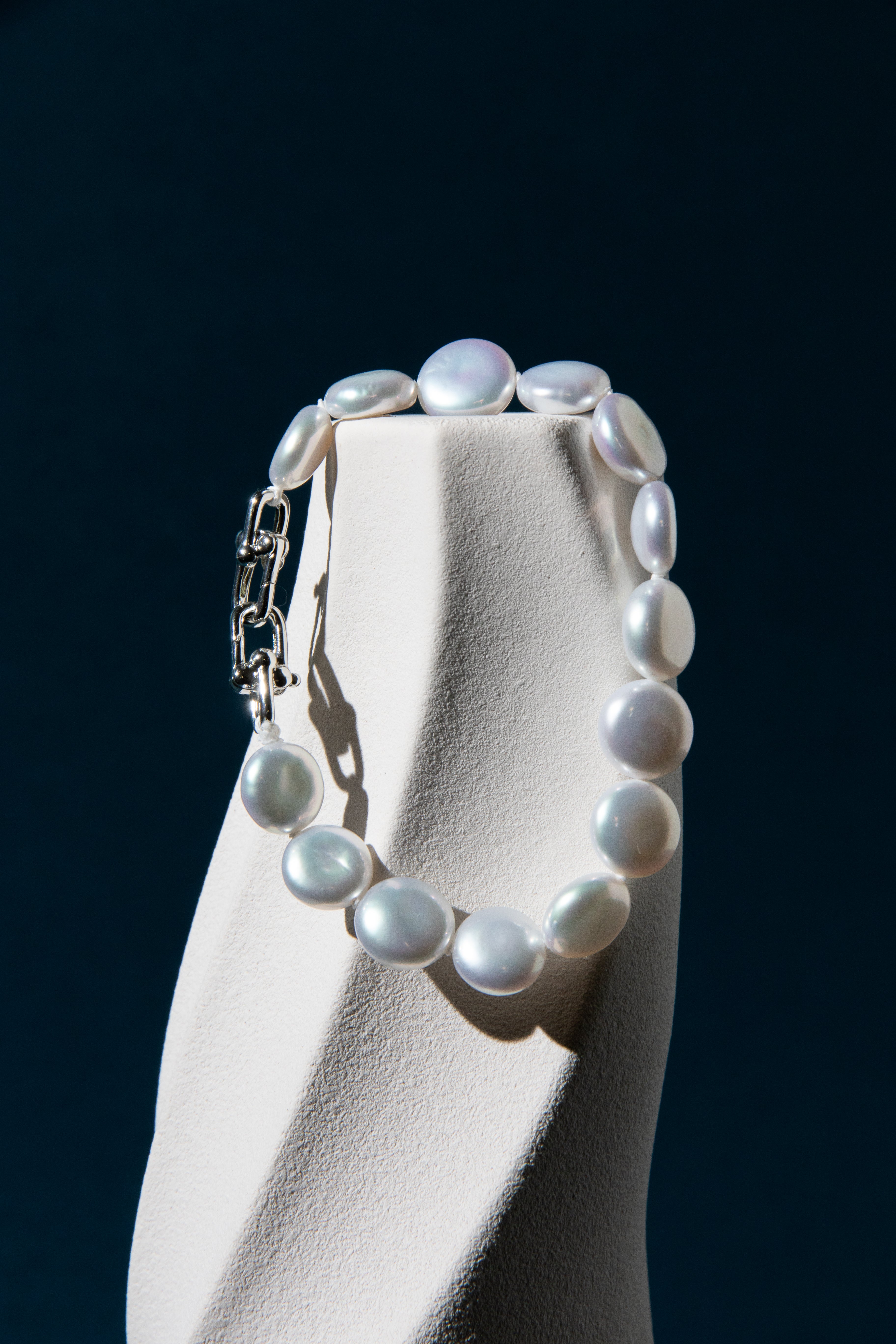 Top excellent level smooth flat button pearls in shiny standard white bracelets.
