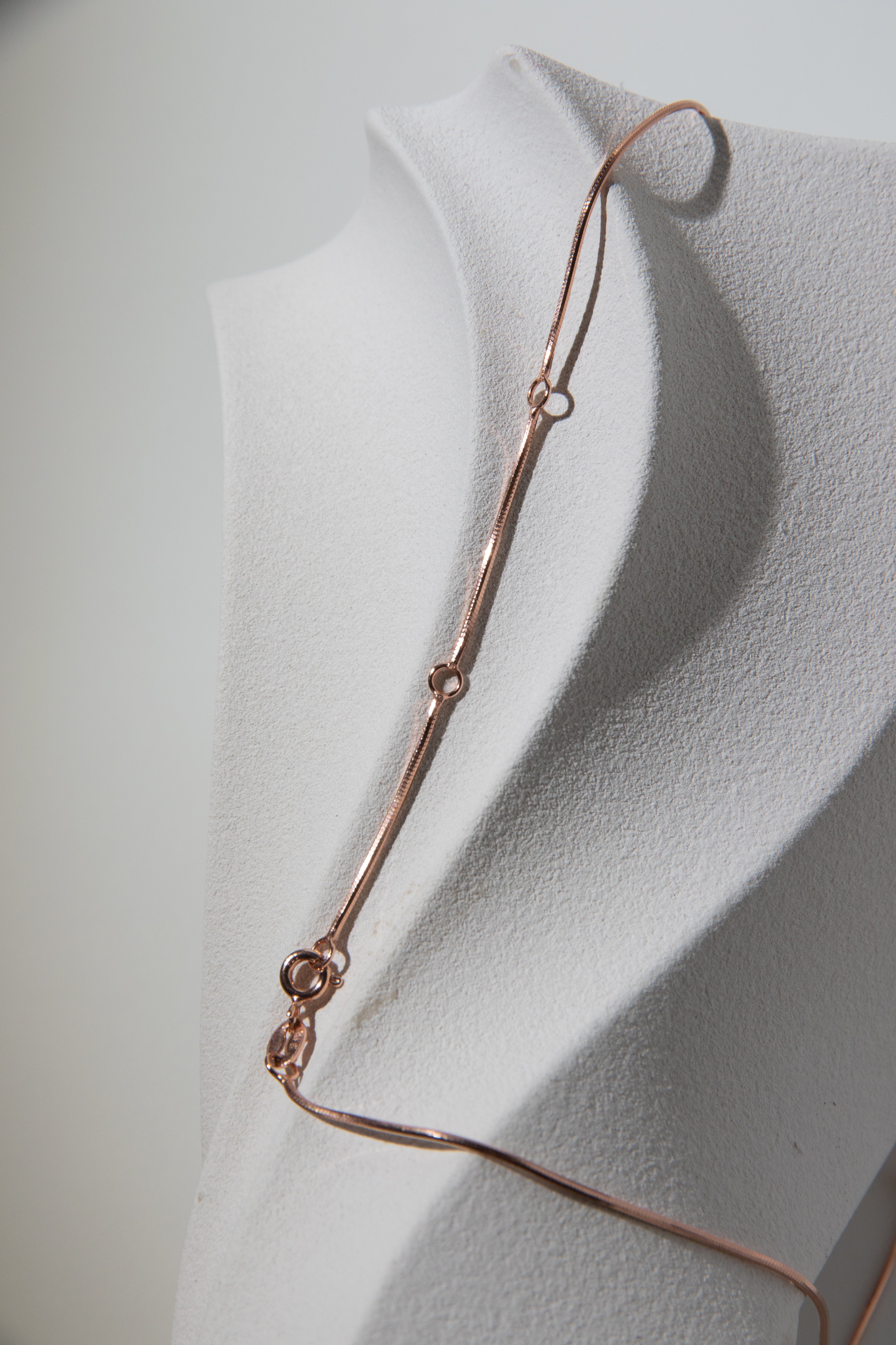 Metallic natural rosegold button pearl necklace set.