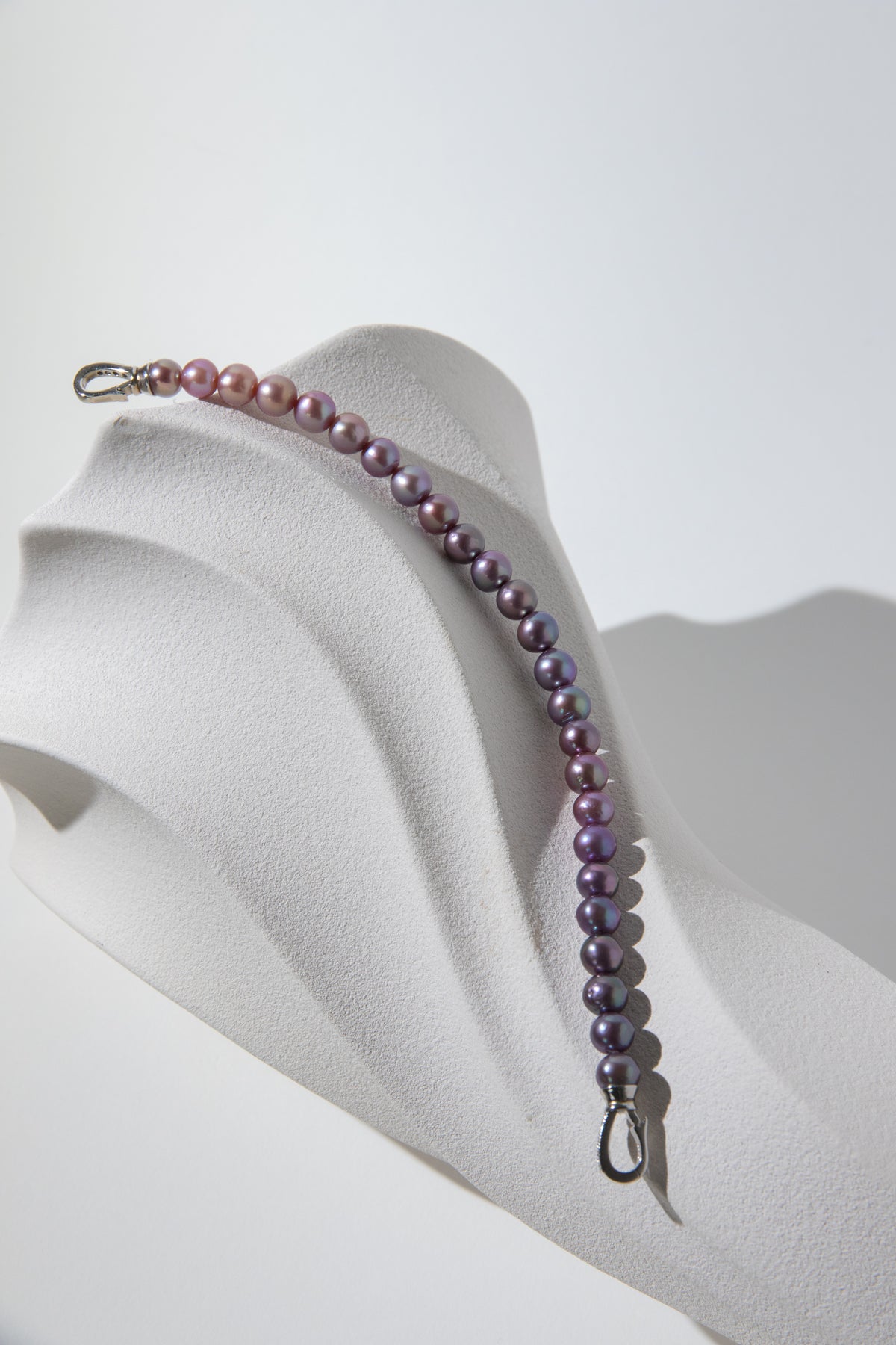 Purple rainbow round pearl bracelets.