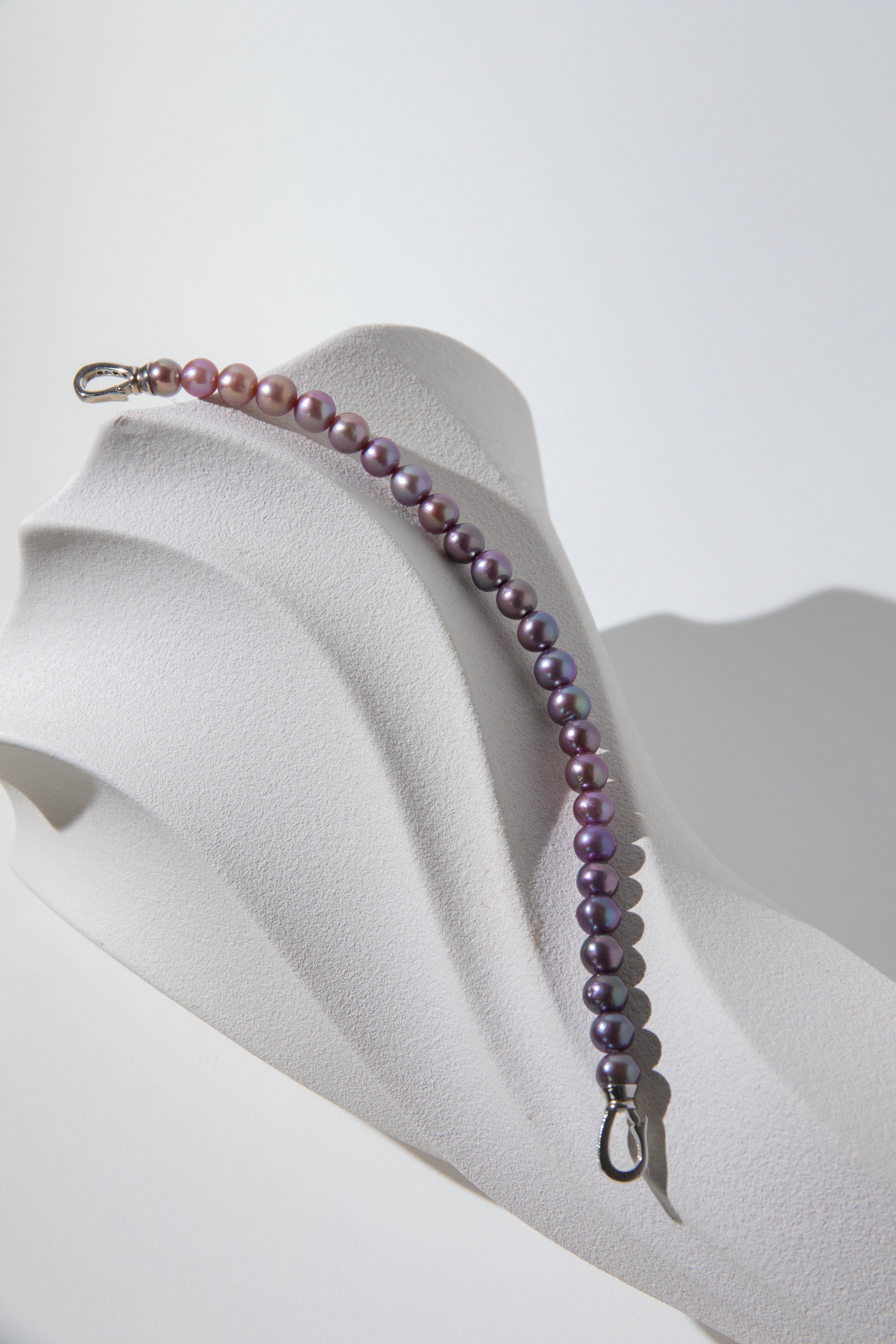 Purple rainbow round pearl bracelets.