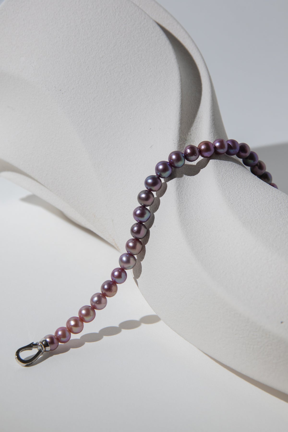Purple rainbow round pearl bracelets.