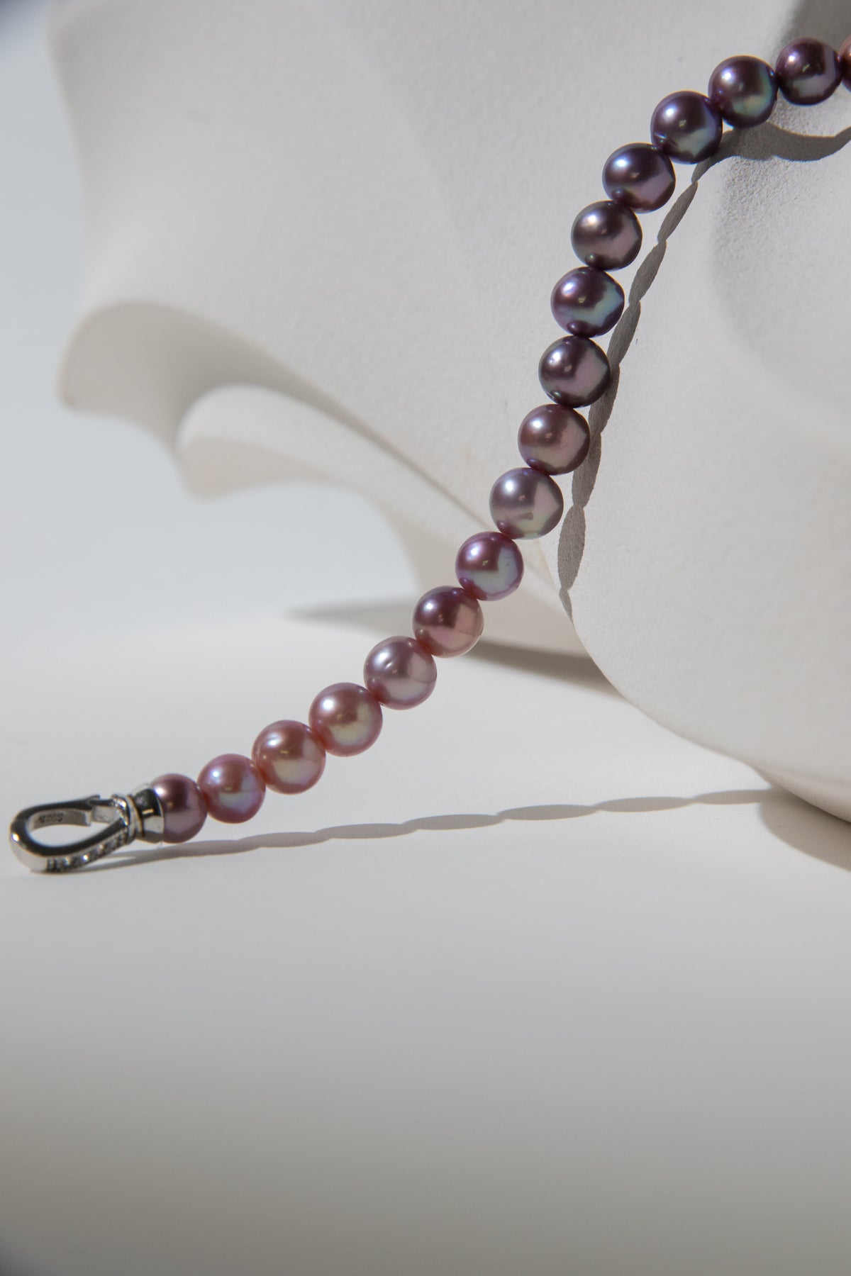 Purple rainbow round pearl bracelets.