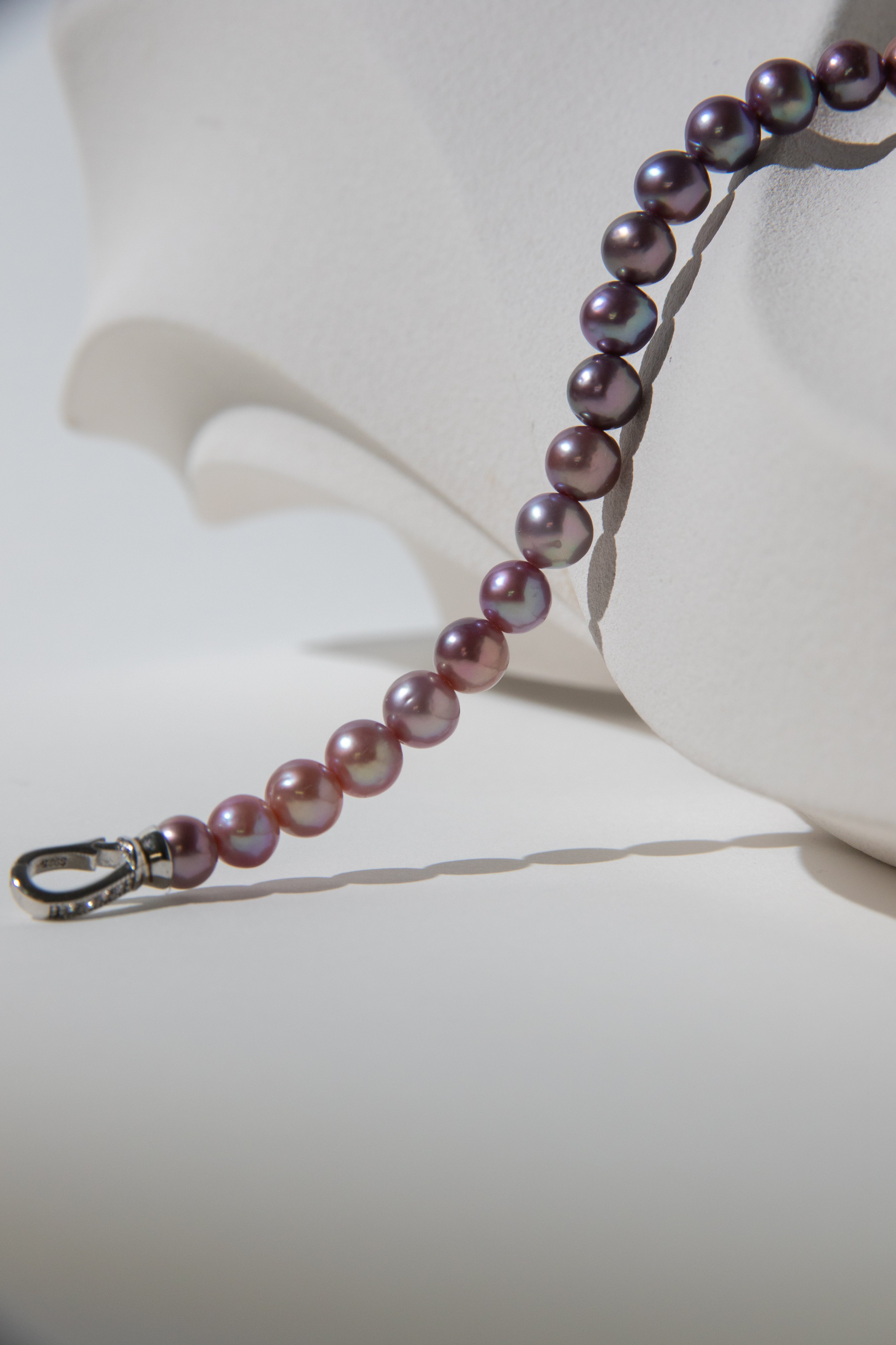 Purple rainbow round pearl bracelets.