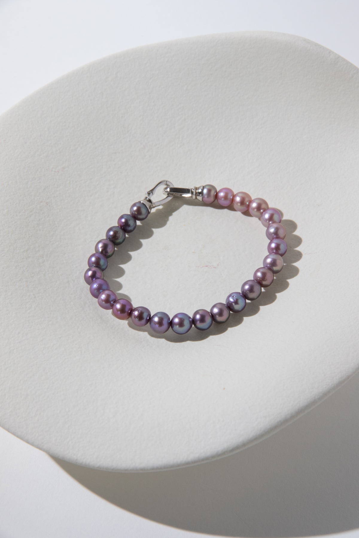 Purple rainbow round pearl bracelets.