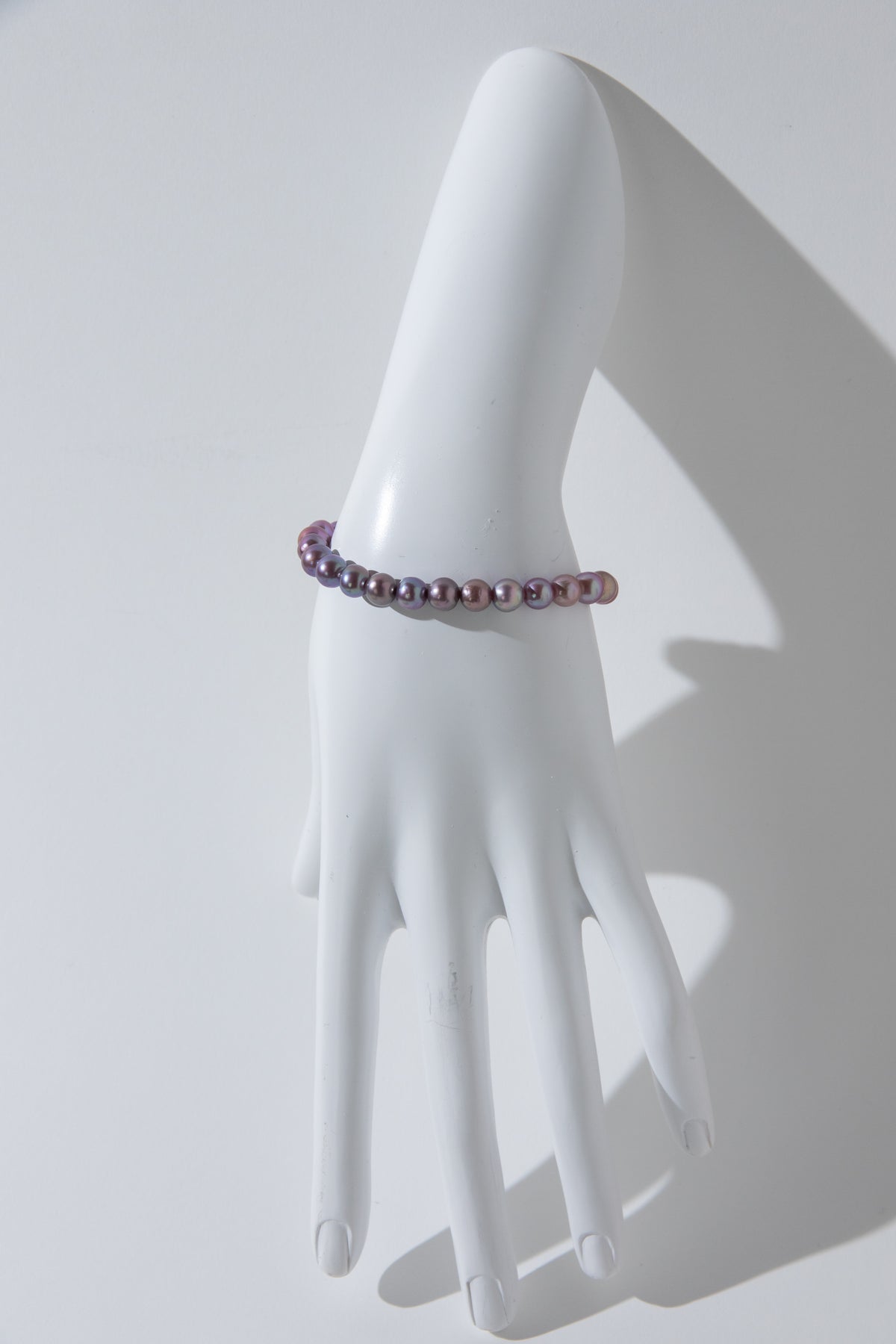 Purple rainbow round pearl bracelets.