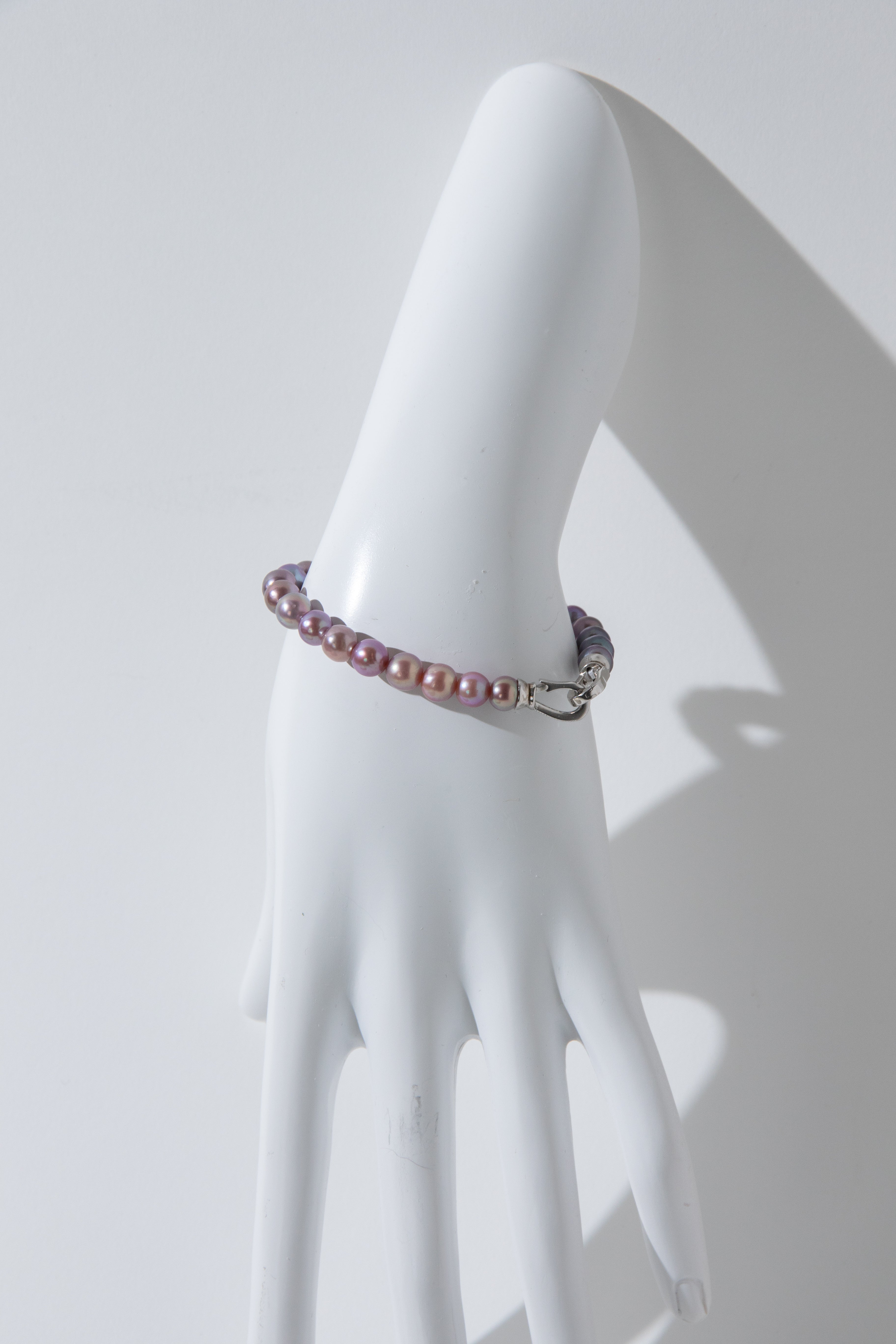 Purple rainbow round pearl bracelets.