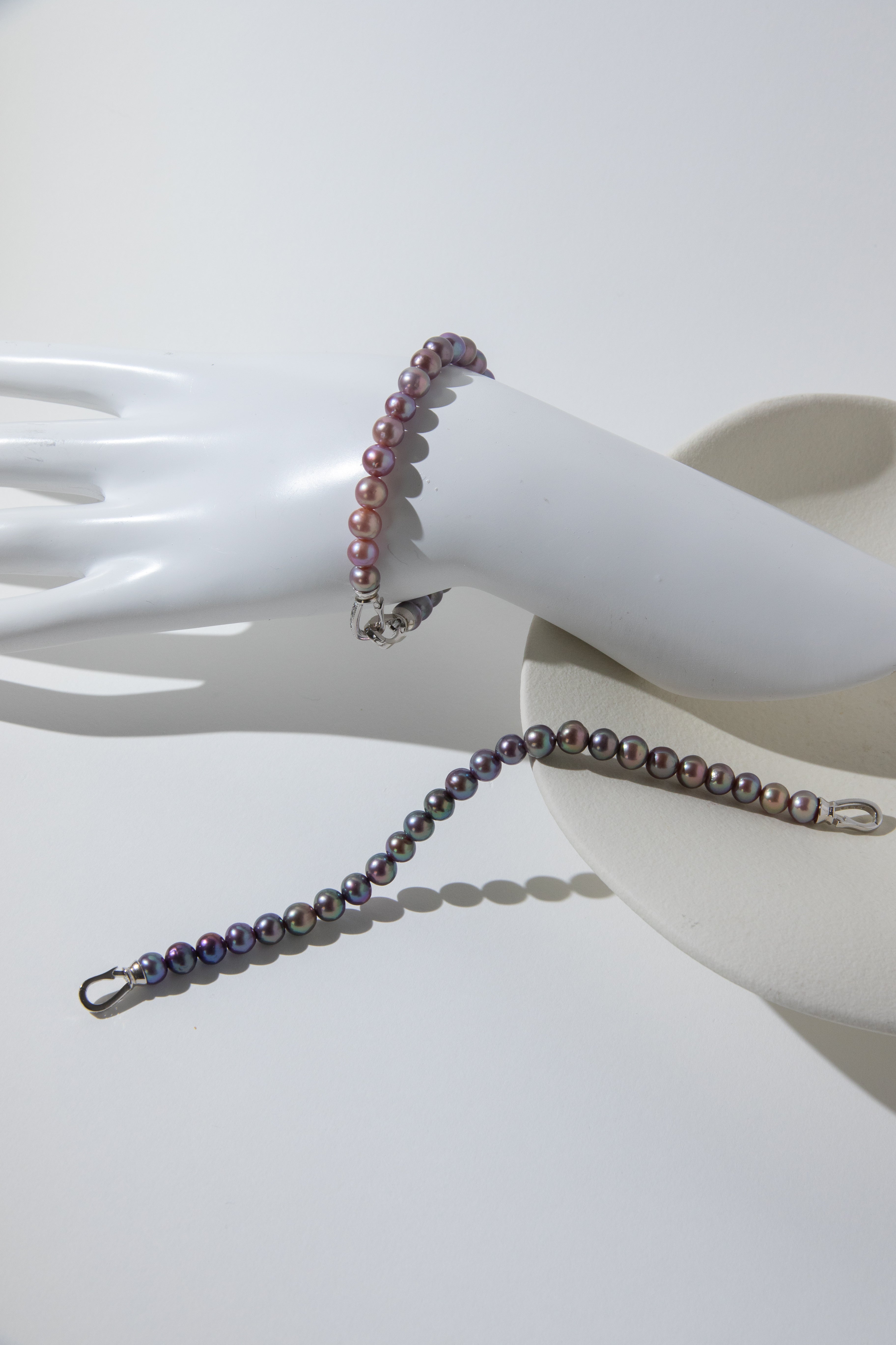 Purple rainbow round pearl bracelets.