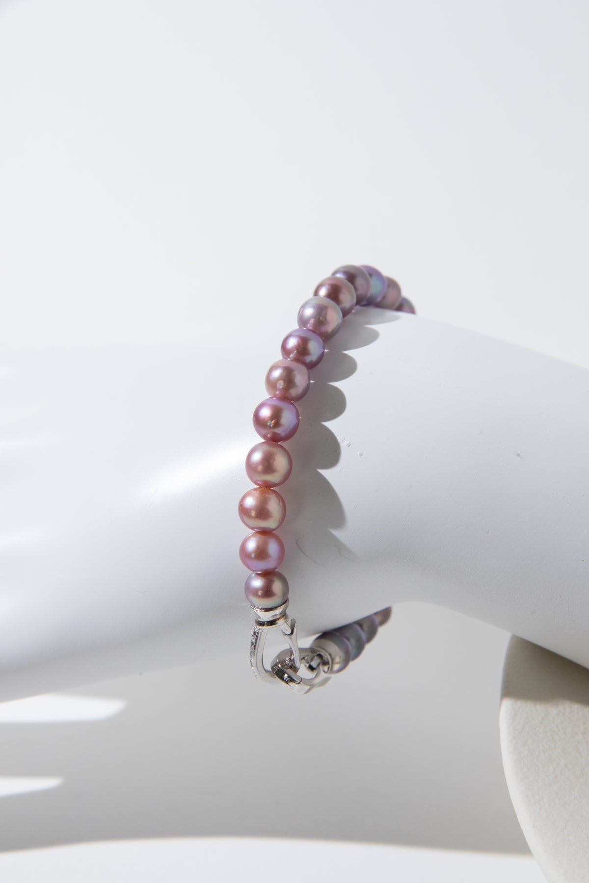 Purple rainbow round pearl bracelets.