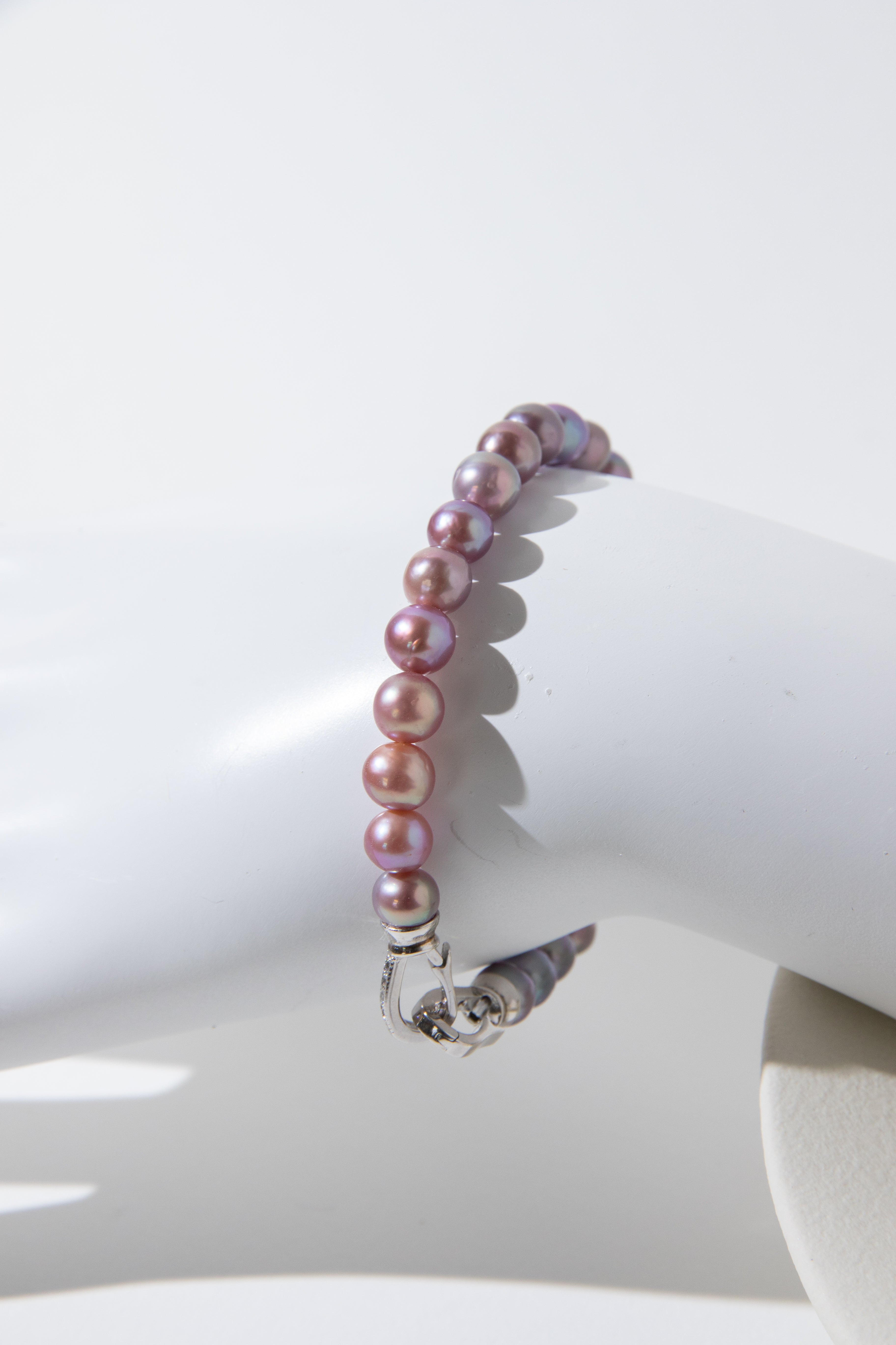 Purple rainbow round pearl bracelets.