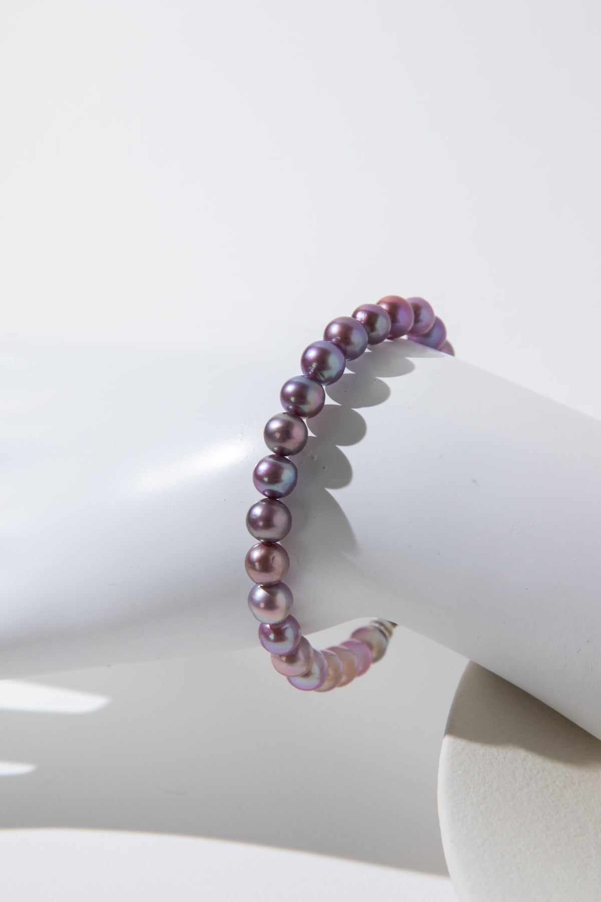 Purple rainbow round pearl bracelets.