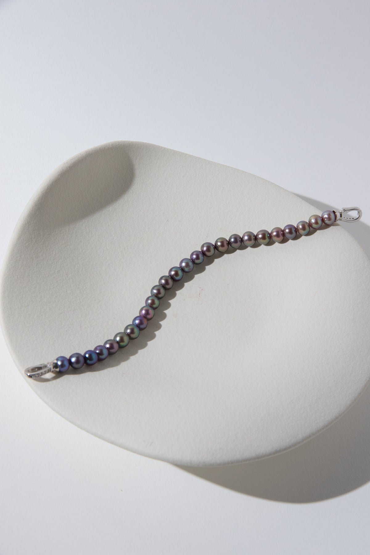Purple rainbow round pearl bracelets.