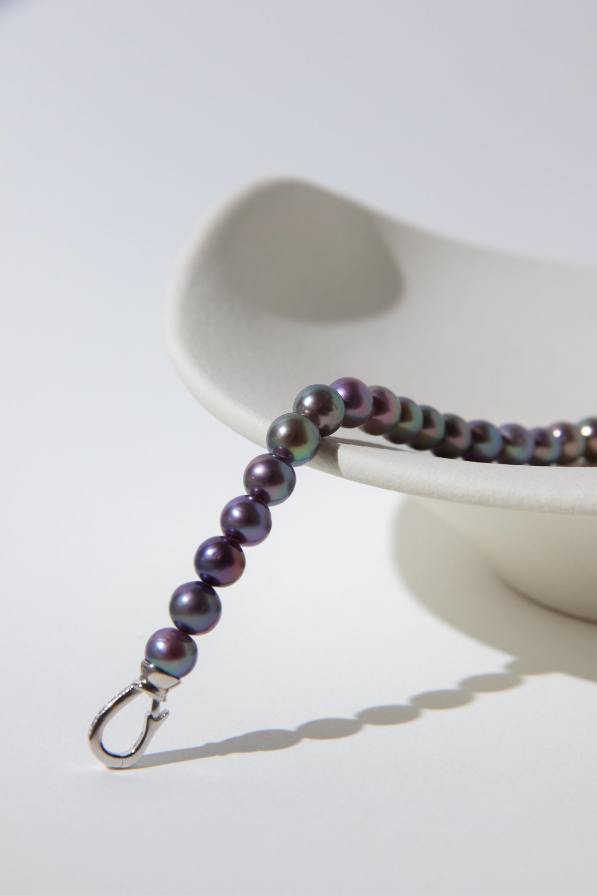 Purple rainbow round pearl bracelets.