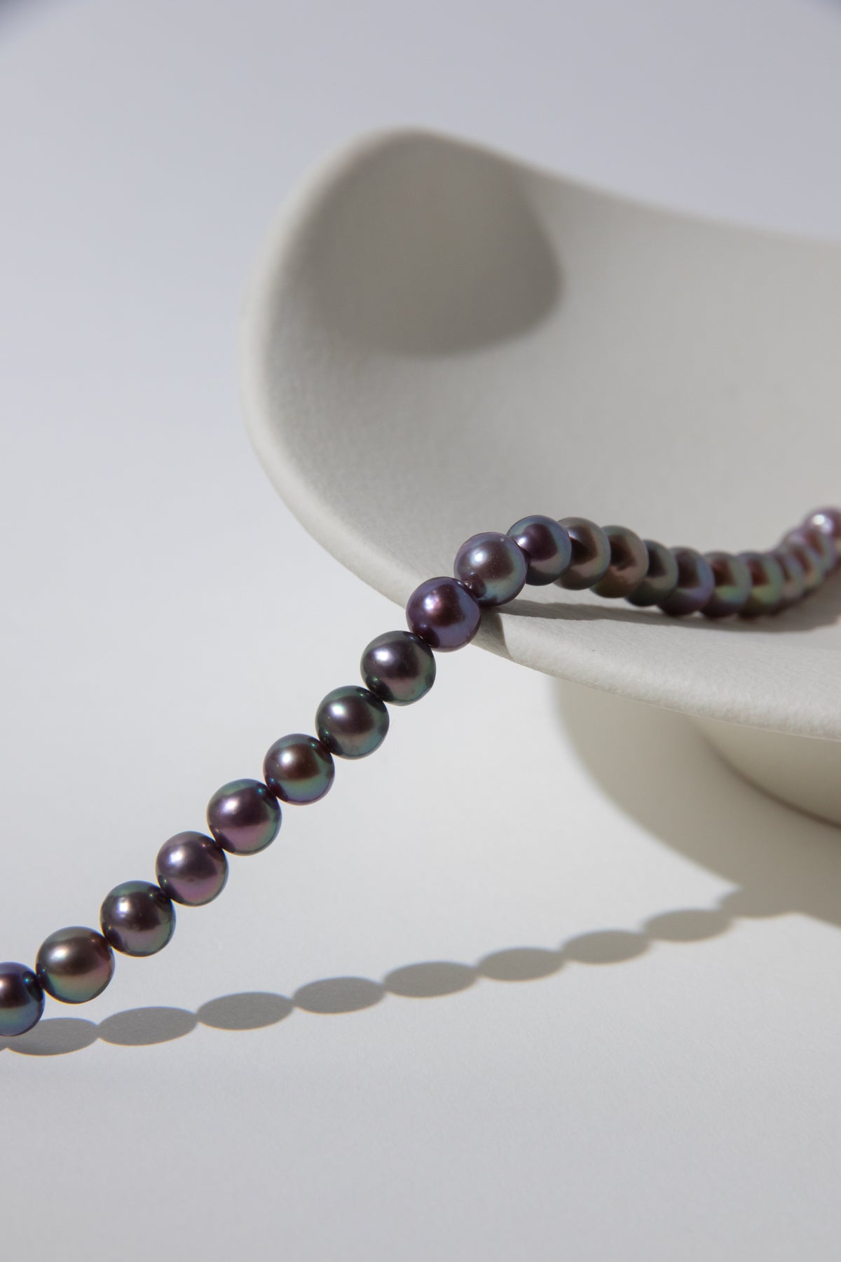 Purple rainbow round pearl bracelets.