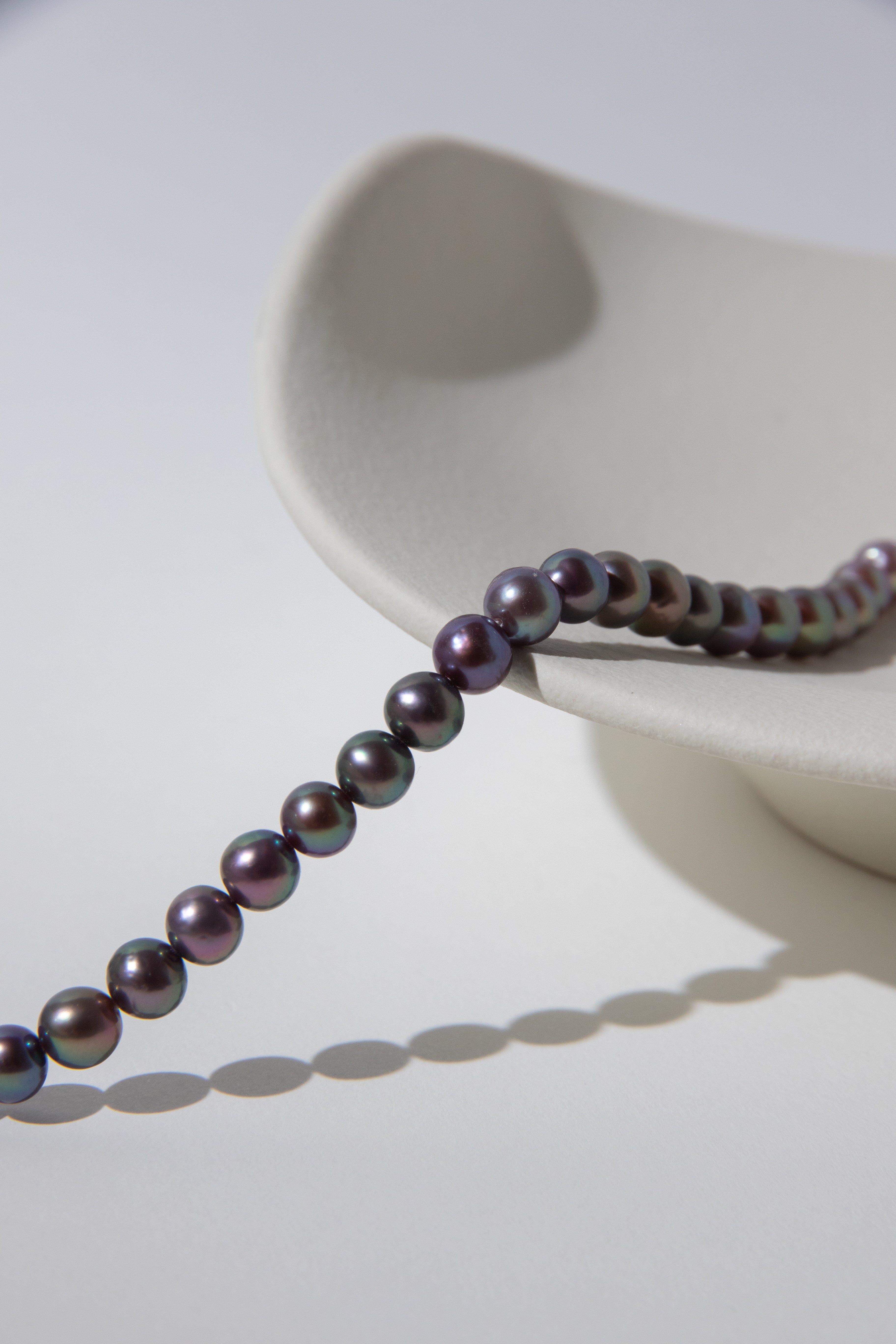 Purple rainbow round pearl bracelets.