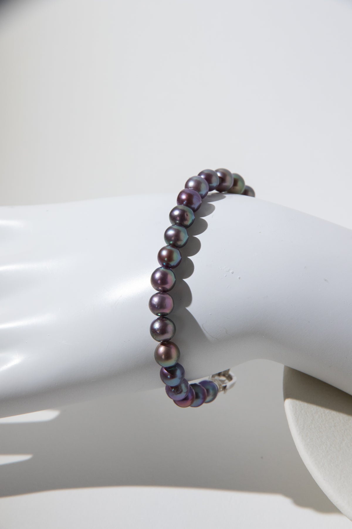Purple rainbow round pearl bracelets.