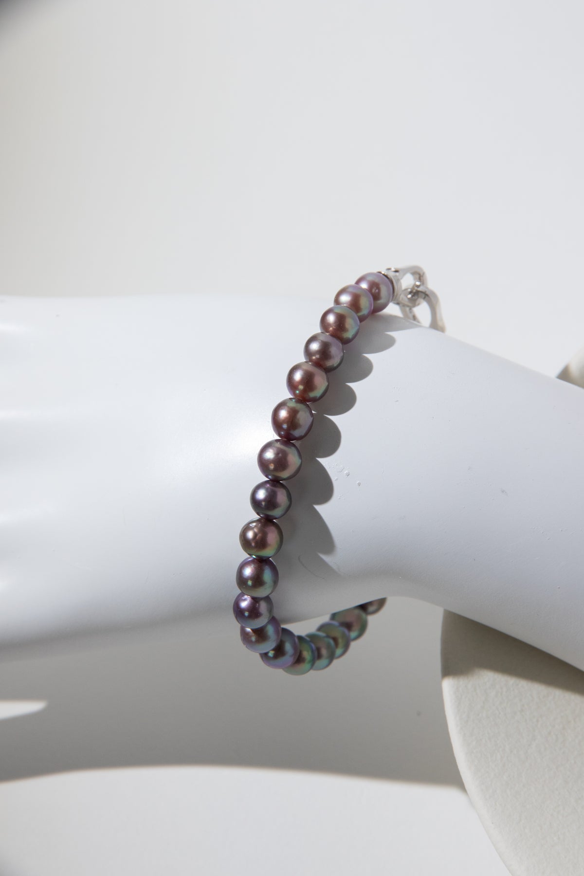 Purple rainbow round pearl bracelets.