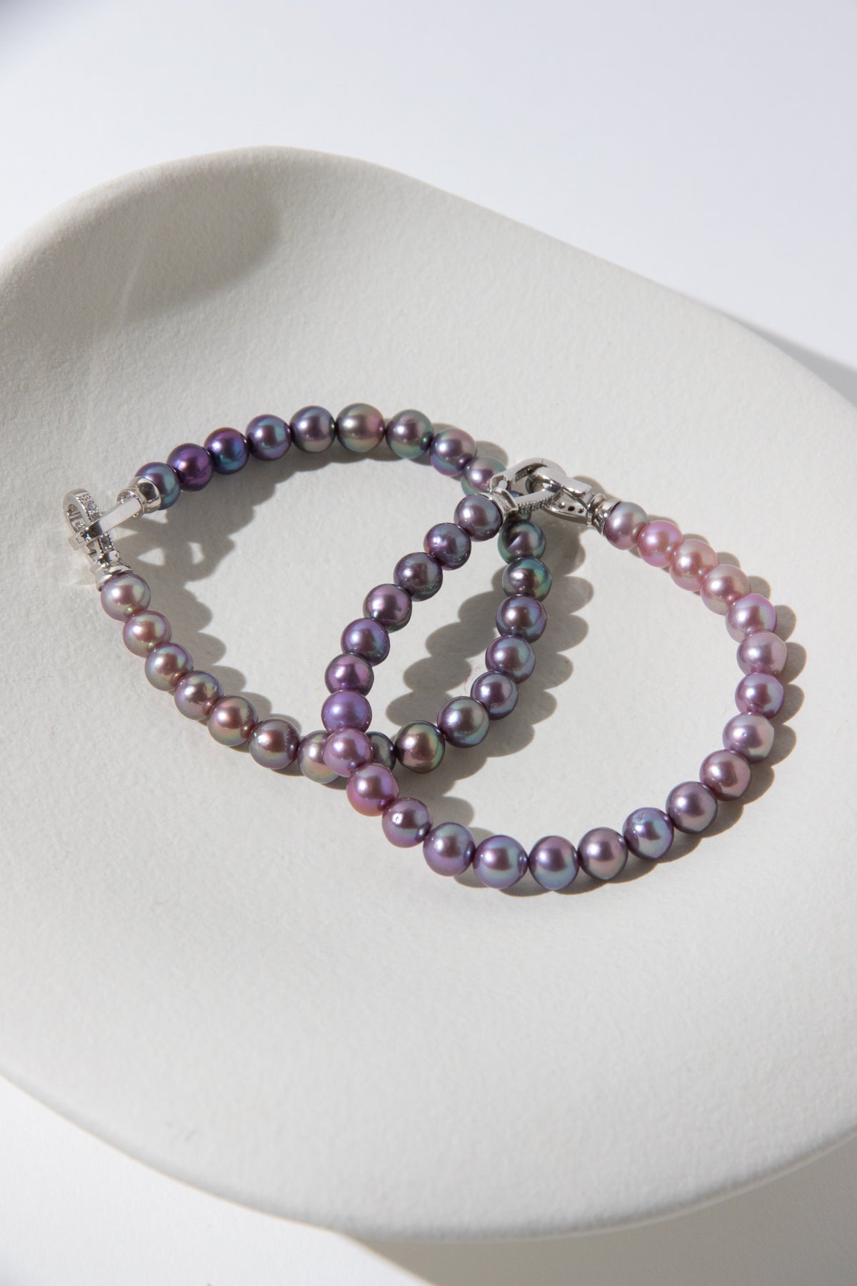 Purple rainbow round pearl bracelets.
